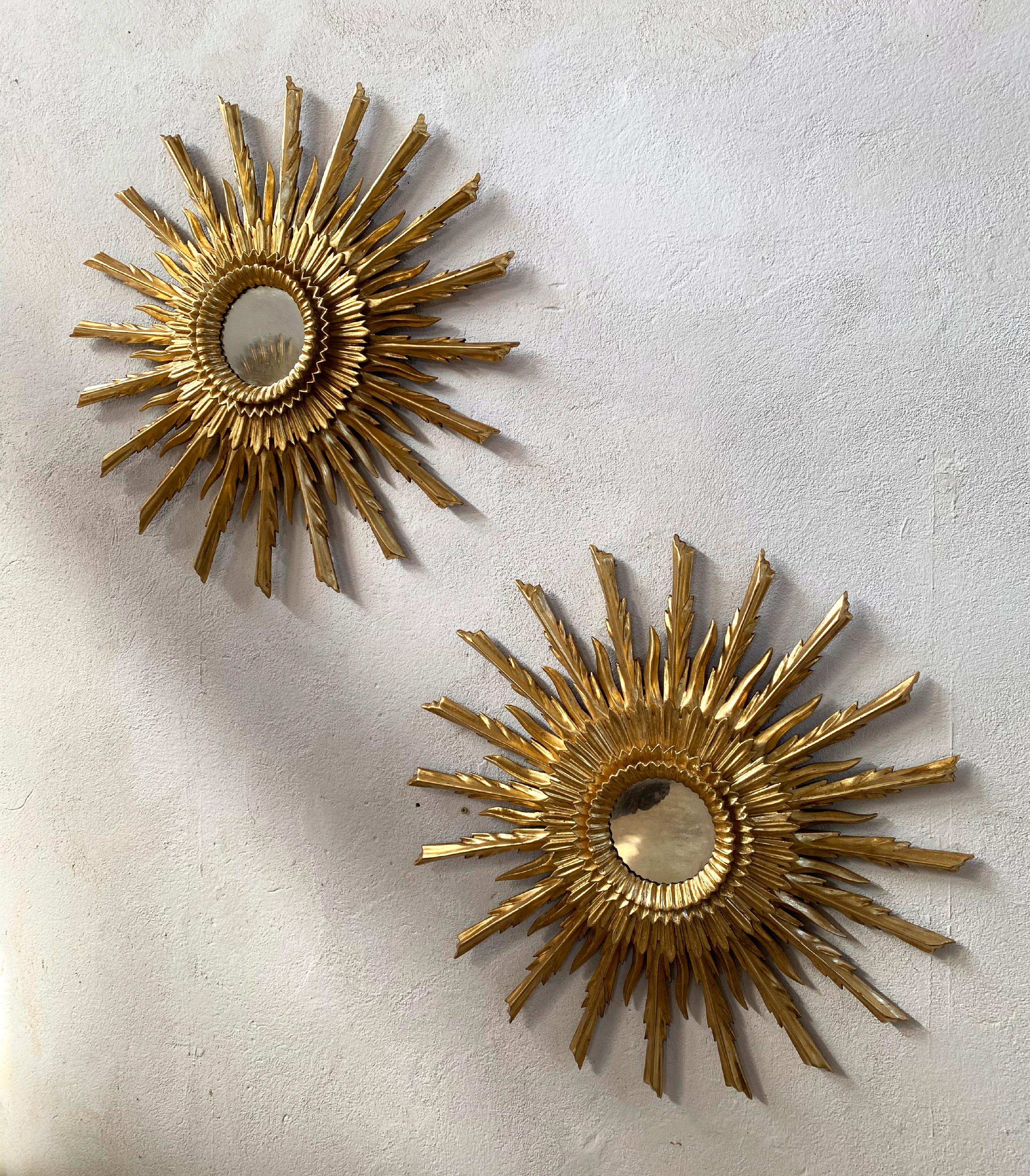 Mid-Century Modern Pair of Mid 20th Century Style Sunburst Carved Golden Mirrors For Sale