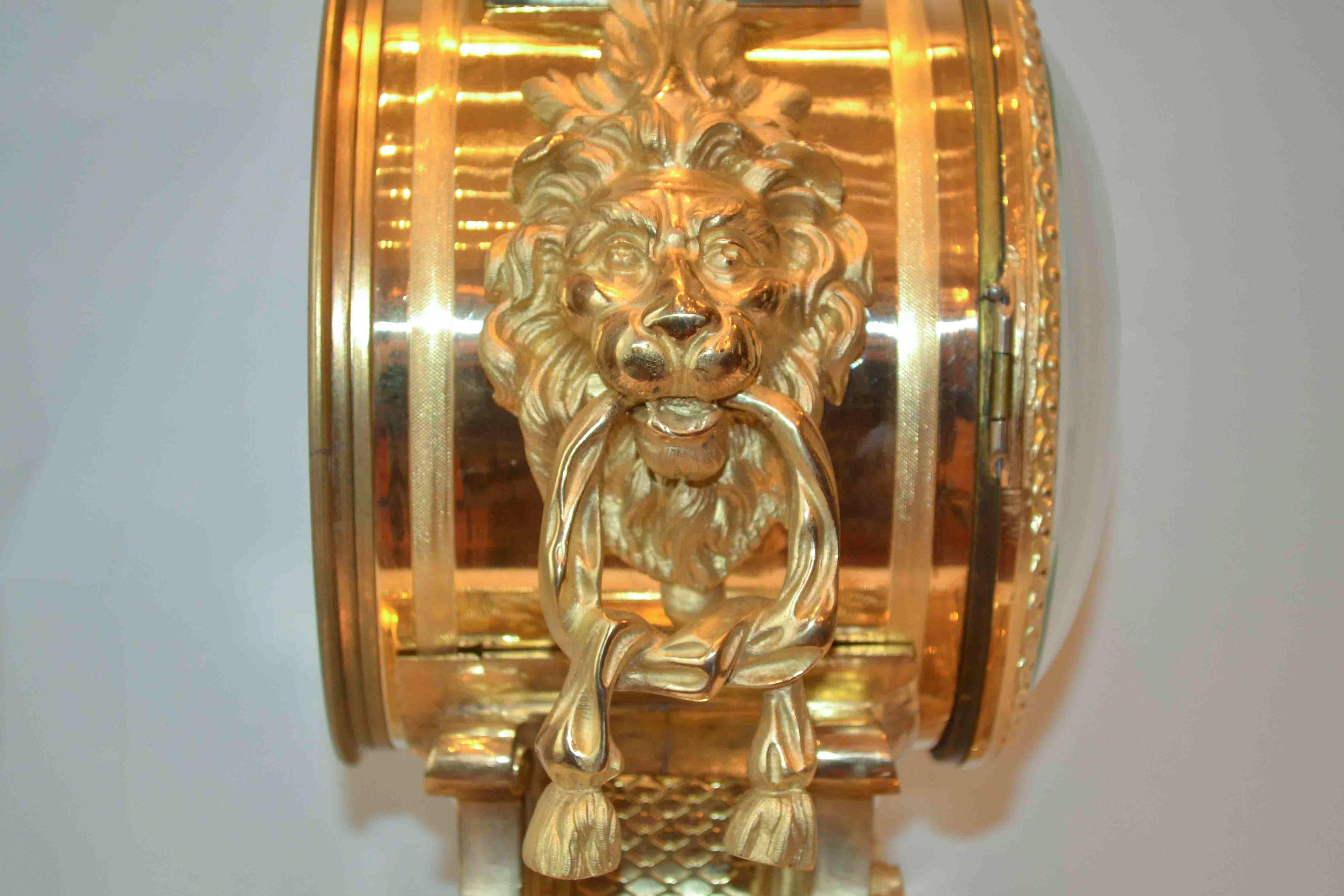 Gilt Louis XVI-Style Lion's Head Clock by G. Philippe For Sale