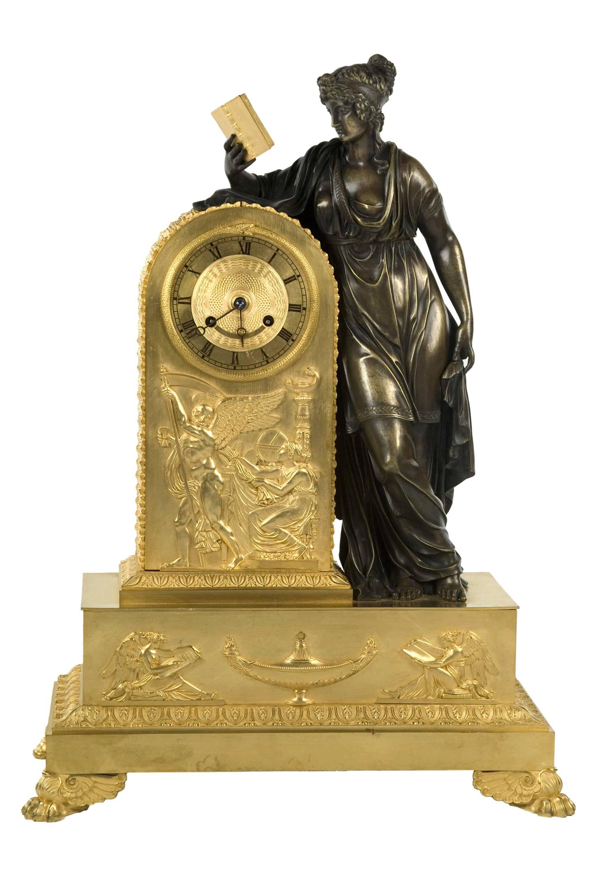 Gilt and patinated bronze period French Empire clock of Clio, the muse of history and writing. Clio was responsible for conveying her wisdom of history into the minds of the human race.

A similar model of clock can be found in the Royal