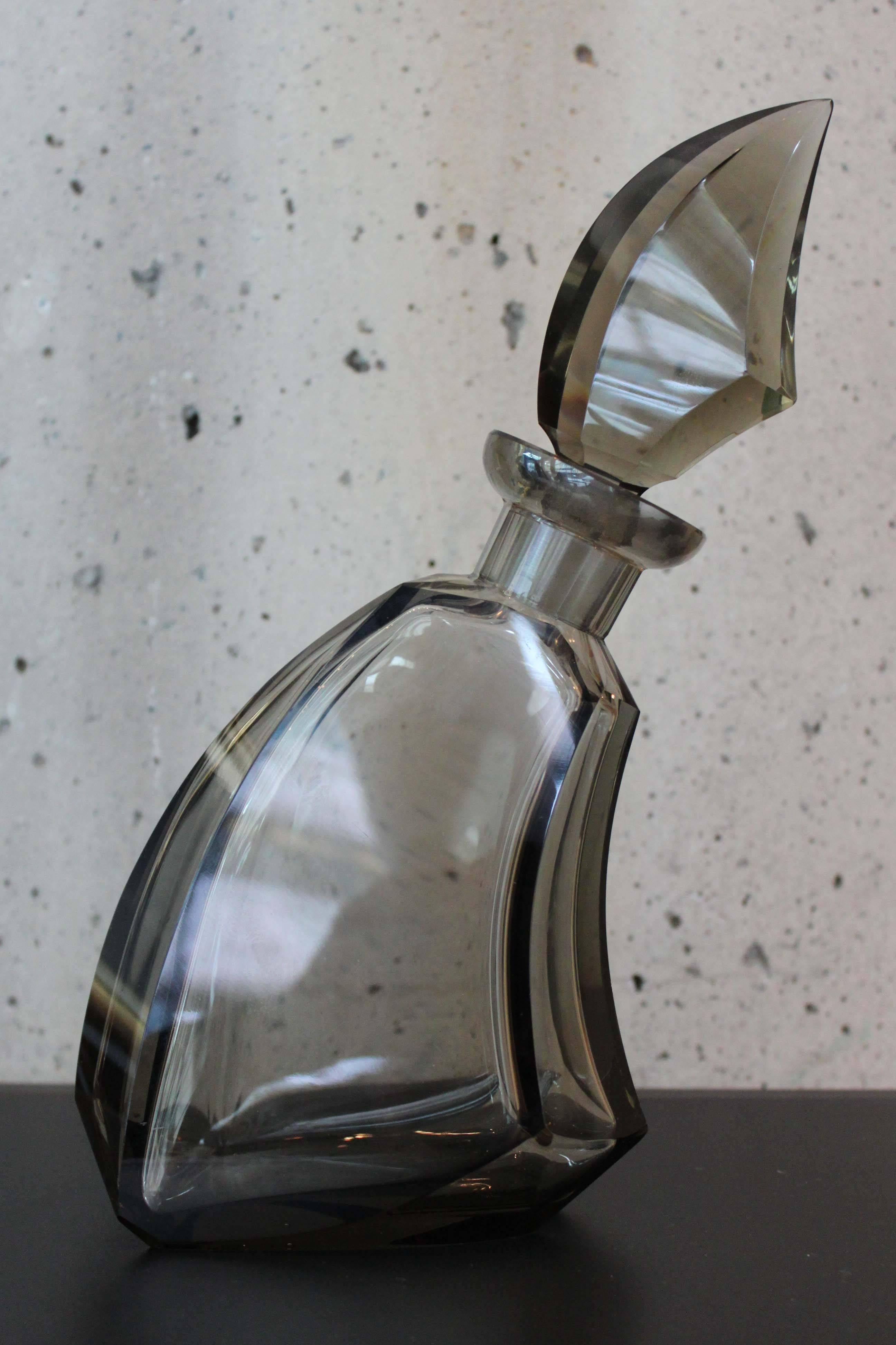 Smoked crystal decanter, circa 1970. Good overall condition with minor surface scratches/scuffs near base, consistent with age and use.