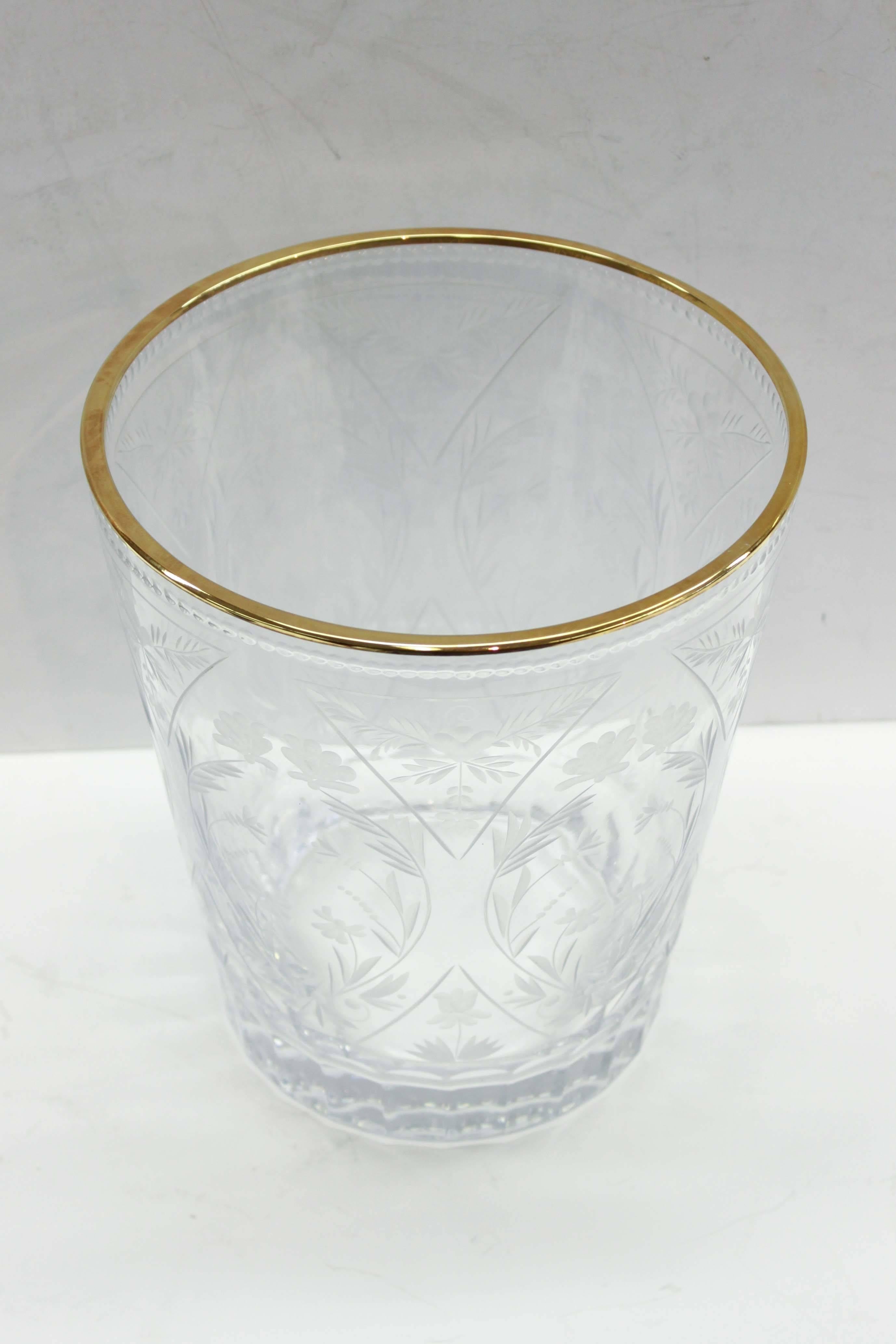 A fine crystal vase signed Fabergé with gold accent. Documentation and original packaging included.