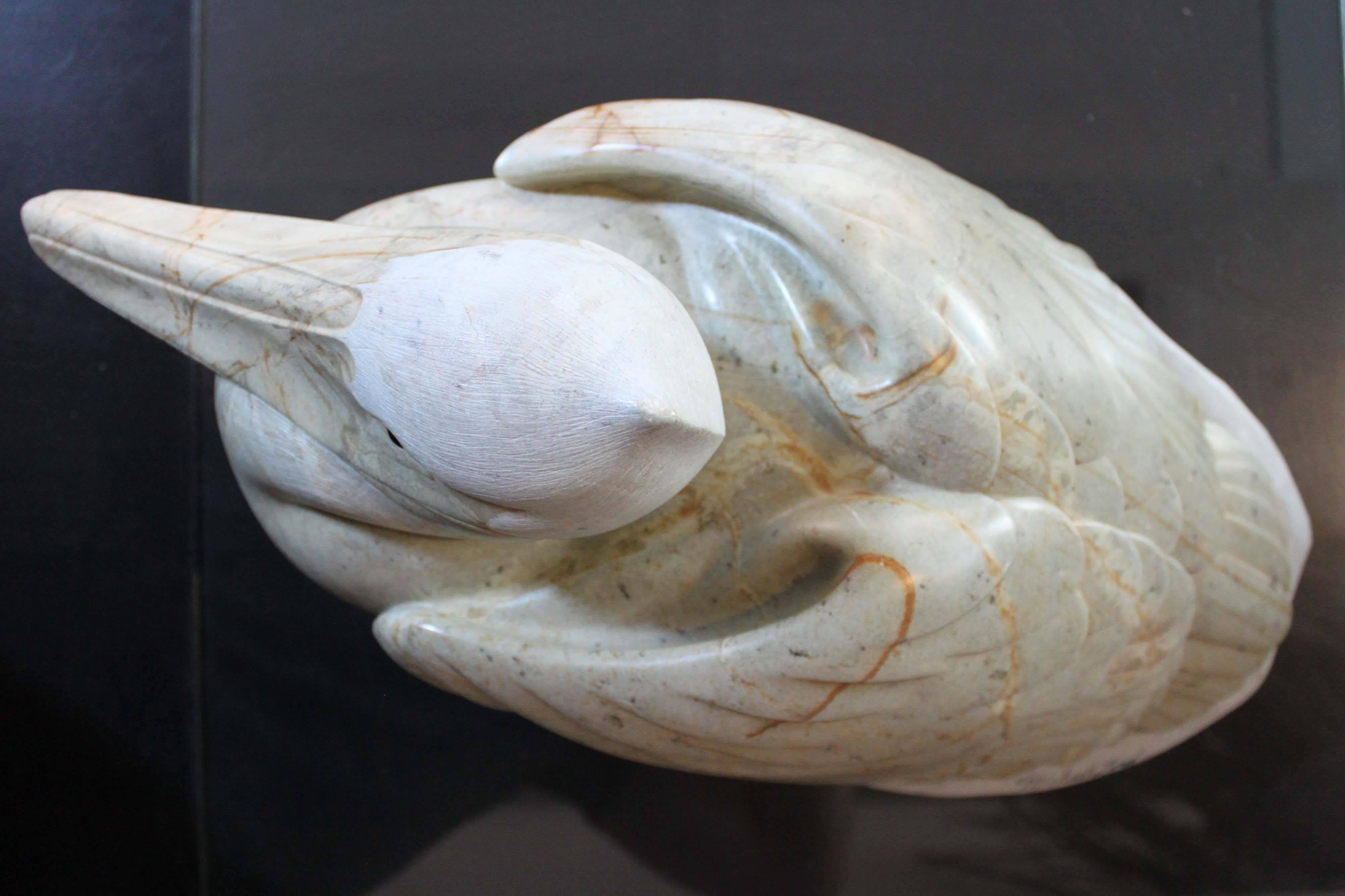 Marble Pelican carving by Canadian artist Michael Lord (1954 - ). A finely detailed, solid marble carving in perfect original condition, signed.