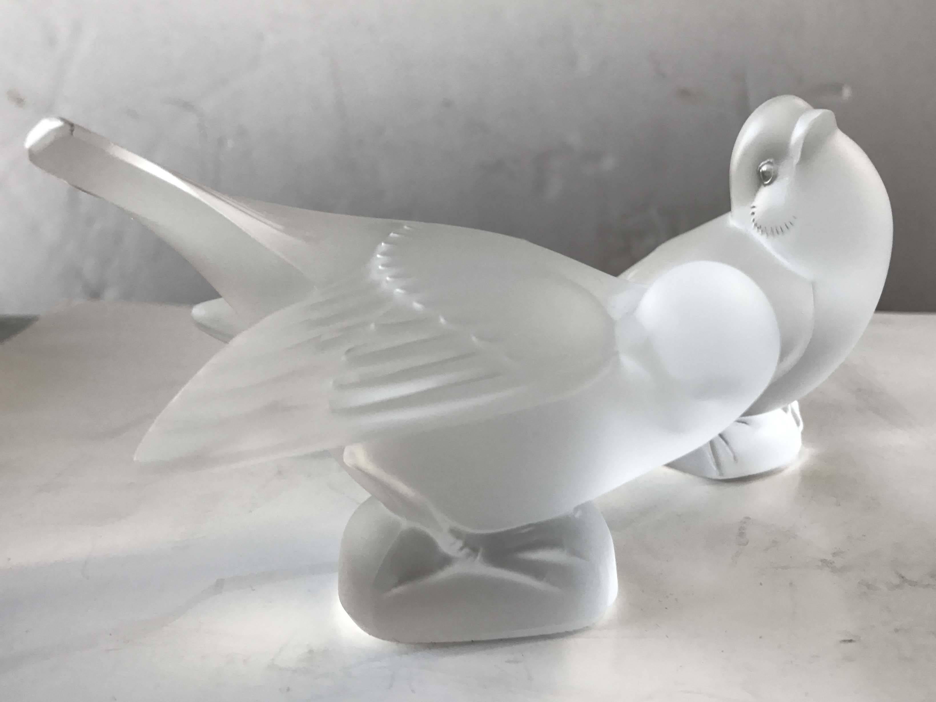 Pair of crystal sparrows by Lalique.