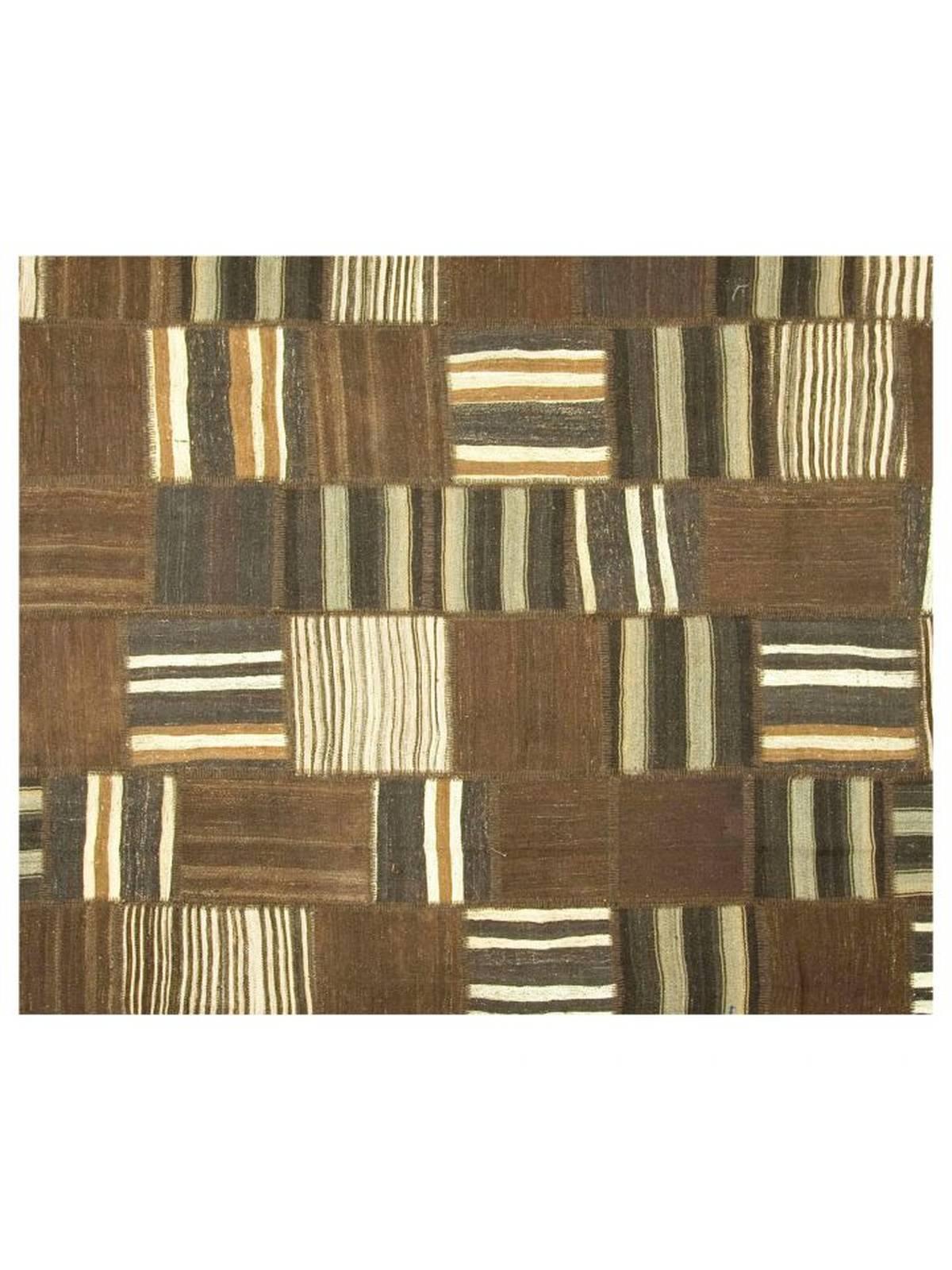 Vintage Turkish handwoven patchwork Kilim in washed out browns and ivory tones. This Kilim is a combination of various handwoven pieces to create a unique, eclectic-looking rug.