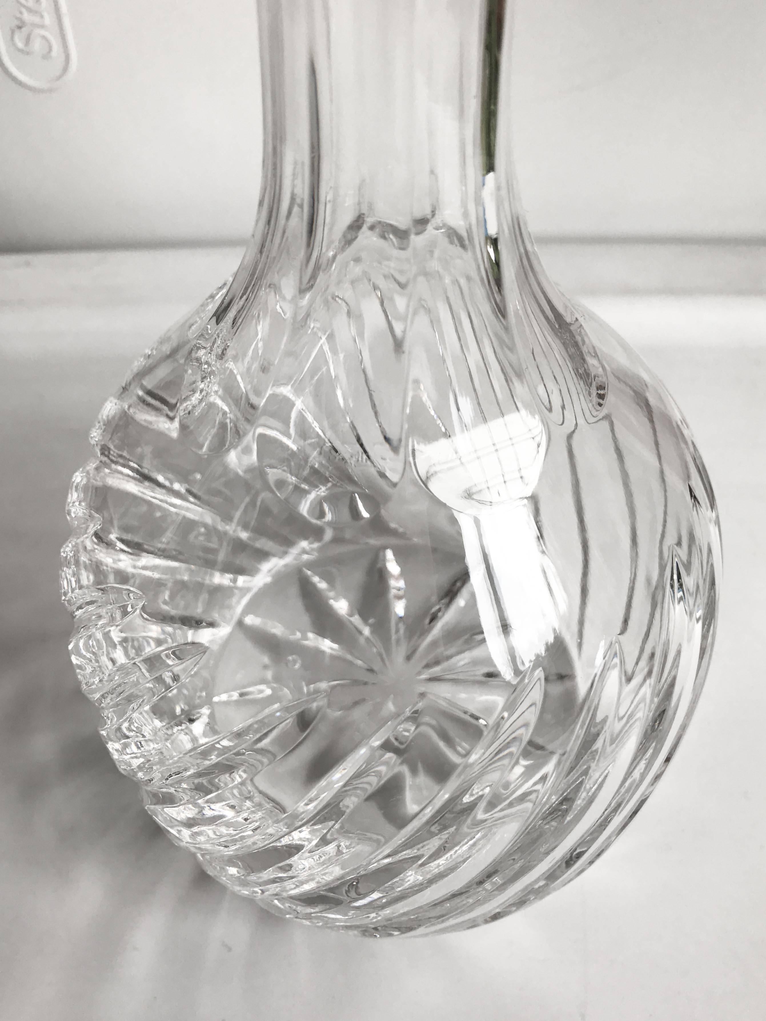 A tall cut crystal decanter, unsigned. Beautiful quality, in very good overall condition with no chips or breaks.