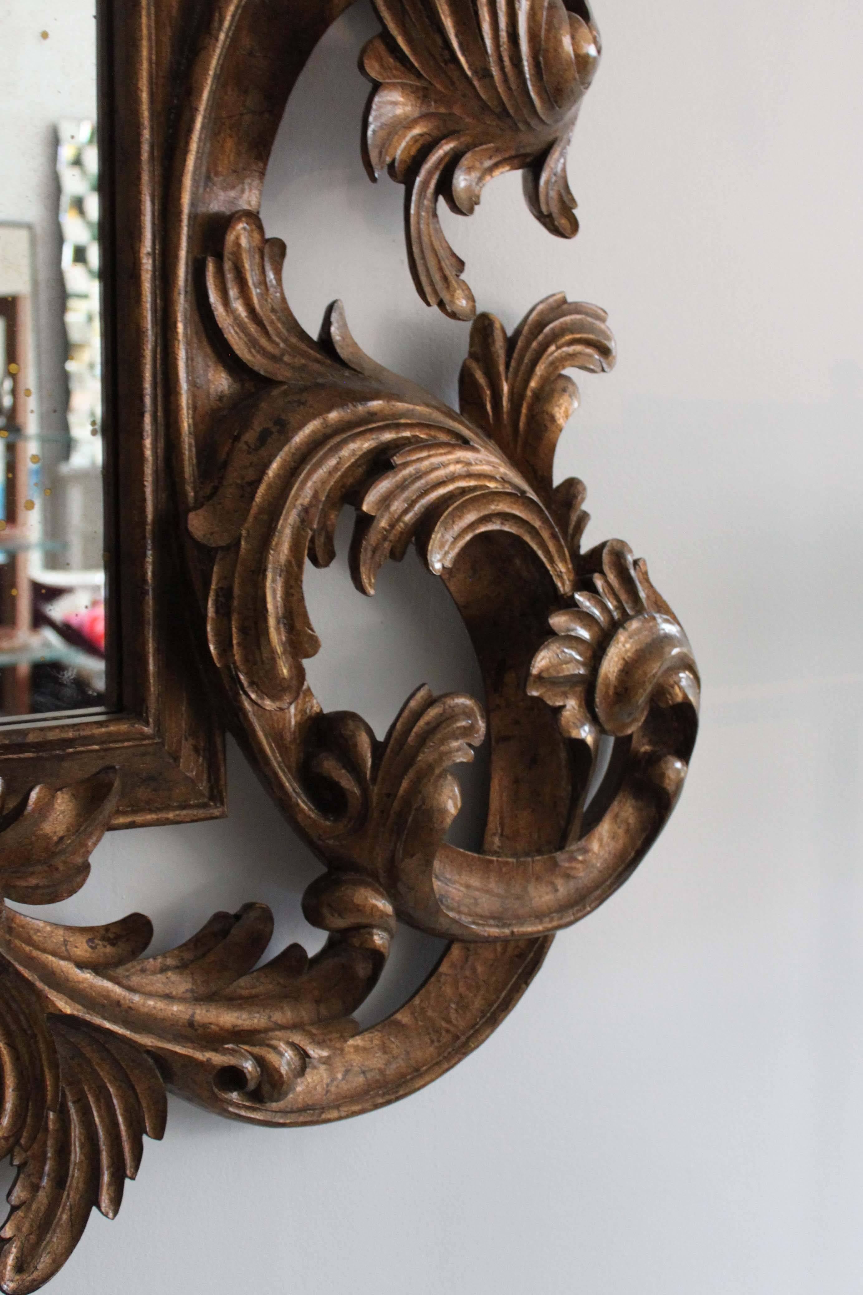 Cedric mirror by Christopher Guy with 12th century gold finish and antique glass.