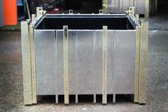 Pair of Planters in the Manner of Paul Evans