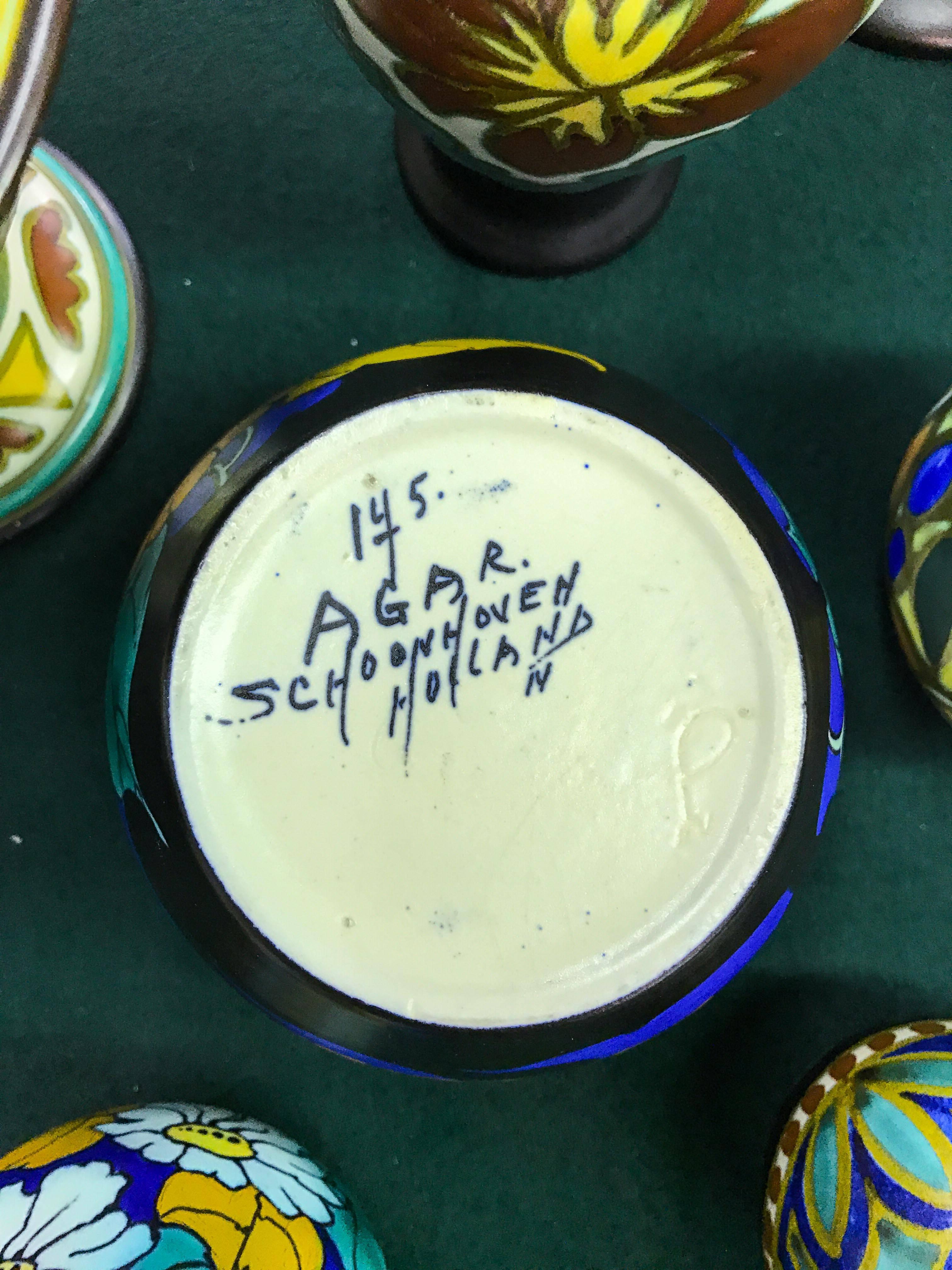 18-Piece Collection of Signed Gouda Pottery For Sale 1