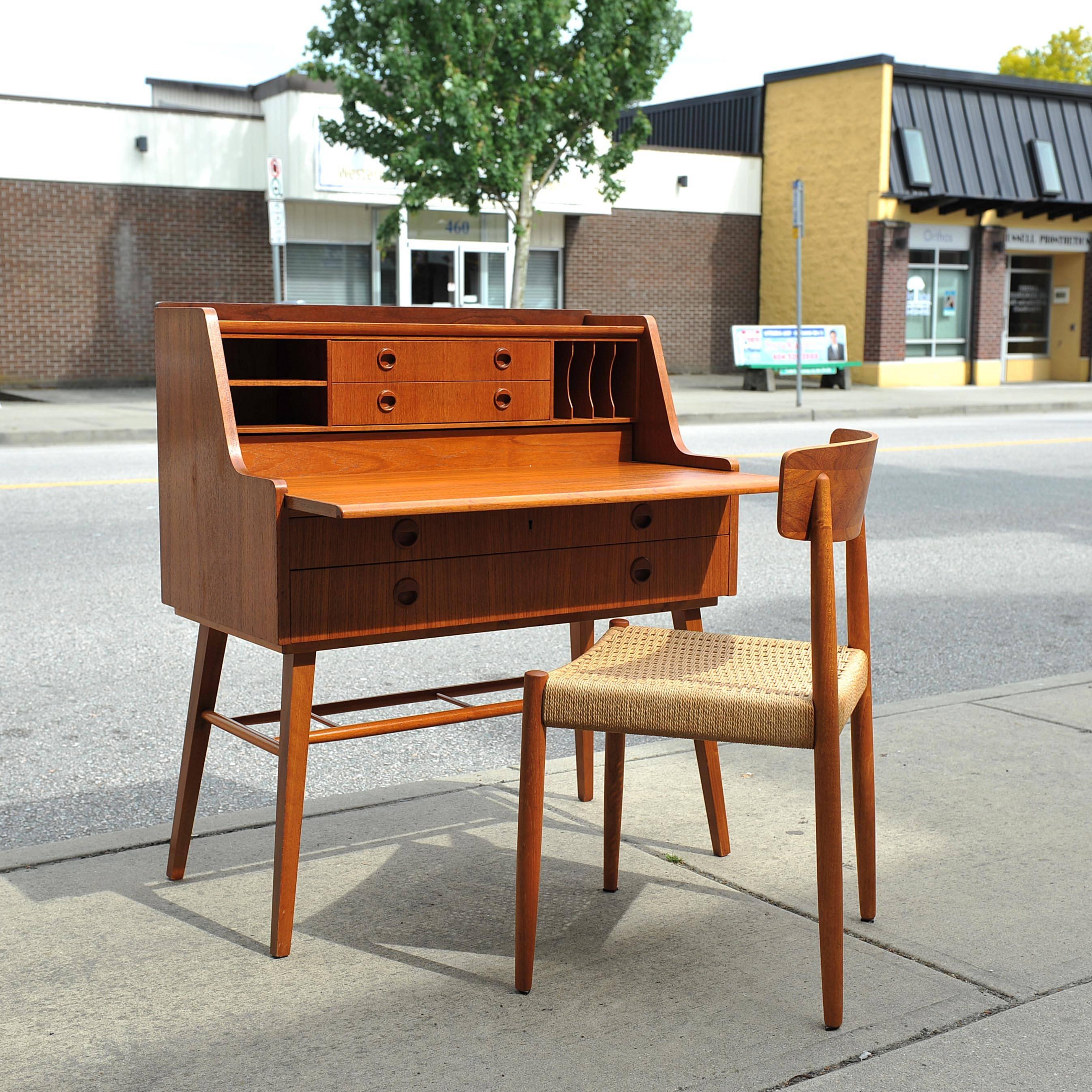 Swedish teak writing desk with matching chair. Very good vintage condition, compact design with plenty of storage. Would make a great vanity.