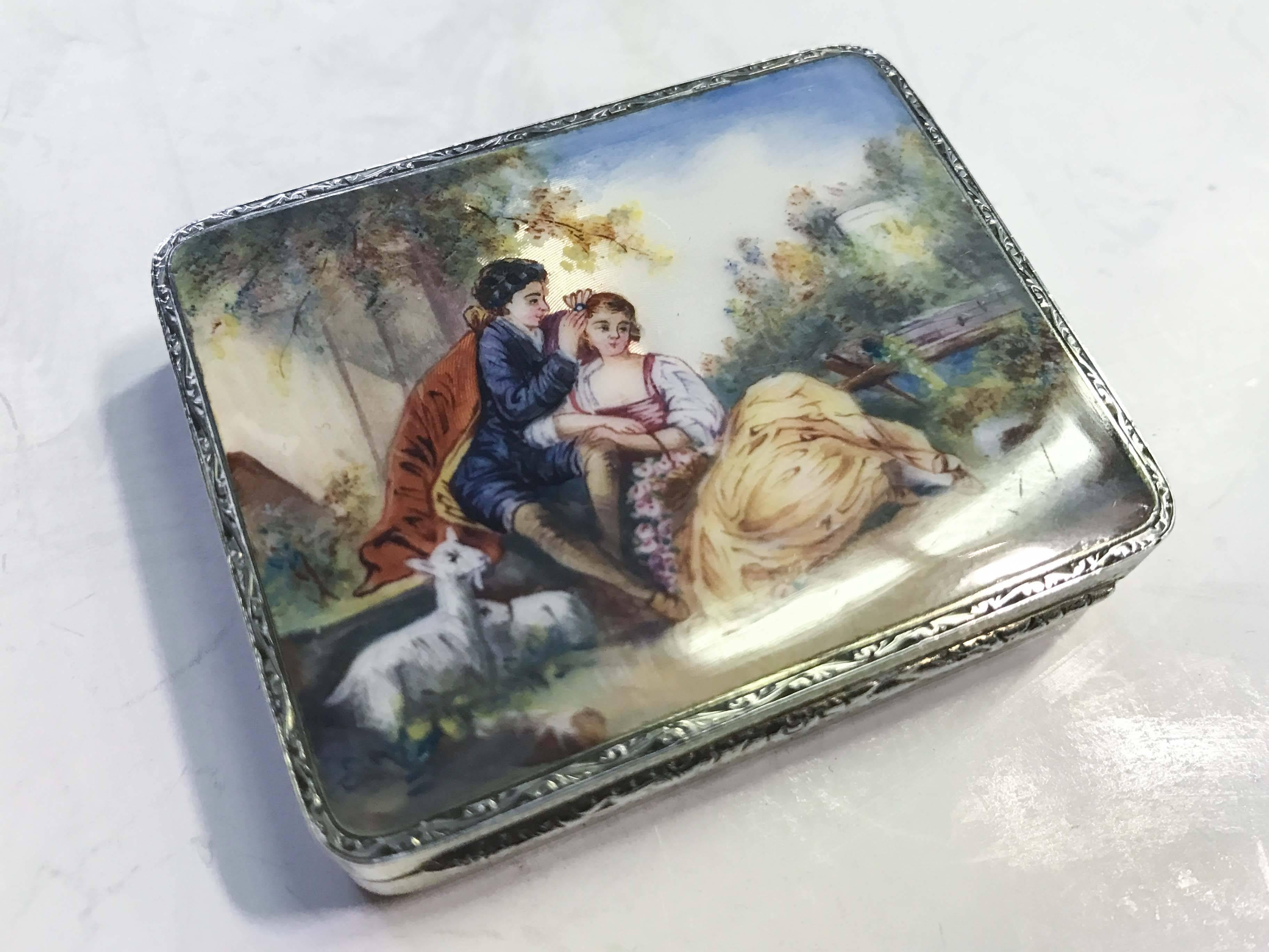 A French enamel and silver compact with English import mark. Very good original condition.