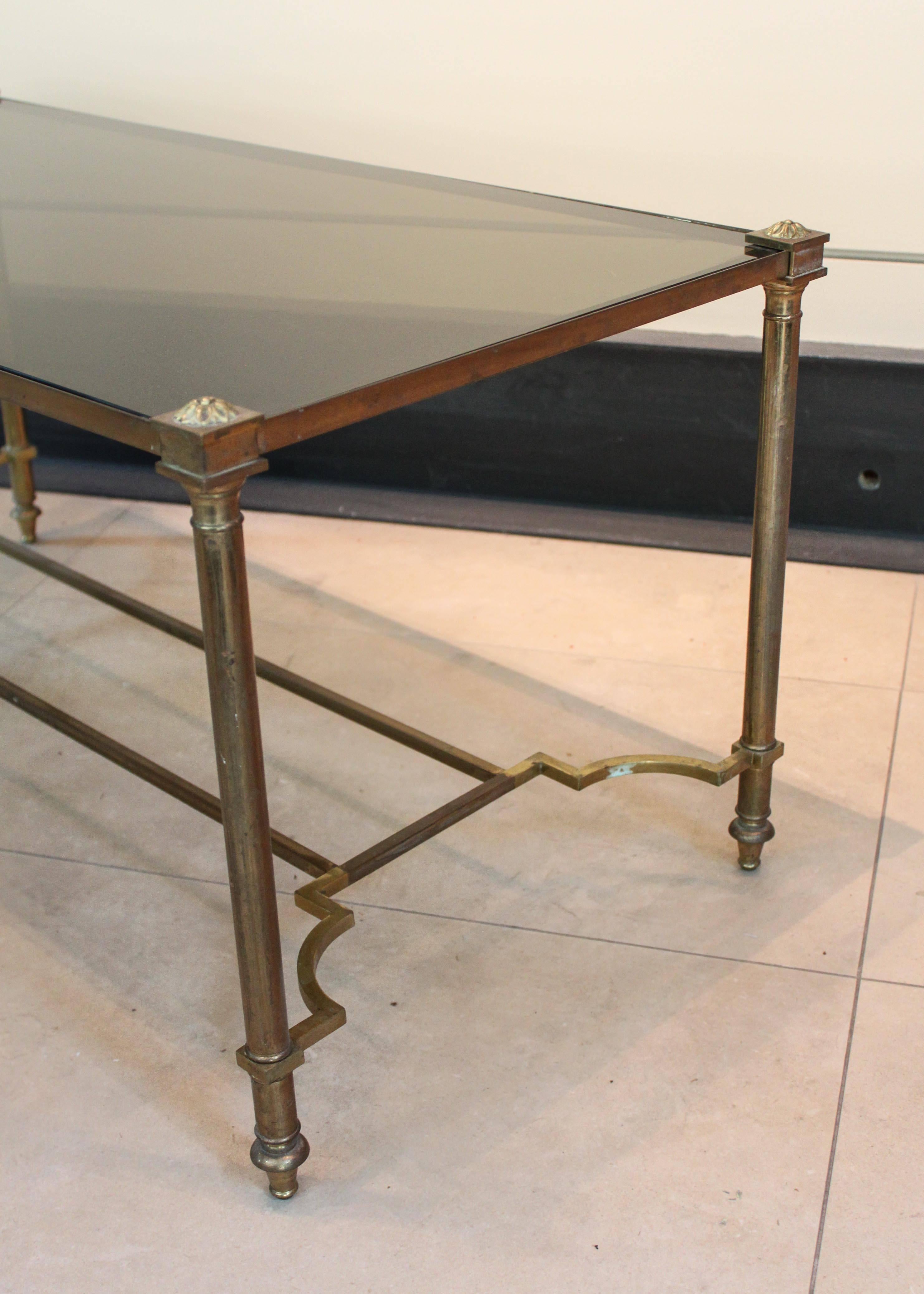 Hollywood Regency Brass and Smoked Glass Coffee Table For Sale