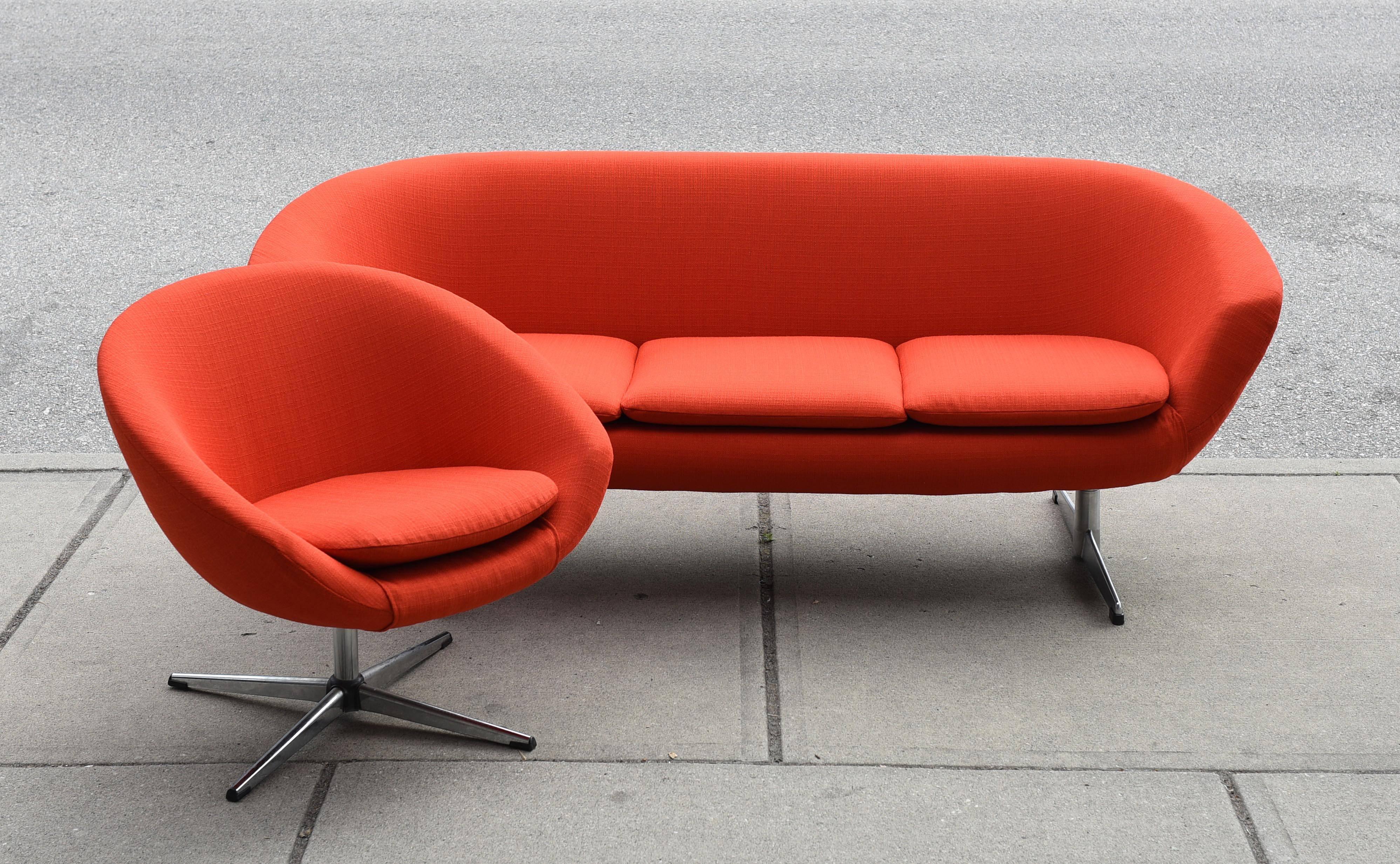 Vintage atomic three-seat sofa and easy chair in new fabric by Overman, Sweden. Very good vintage condition. 
 
Sofa: 69