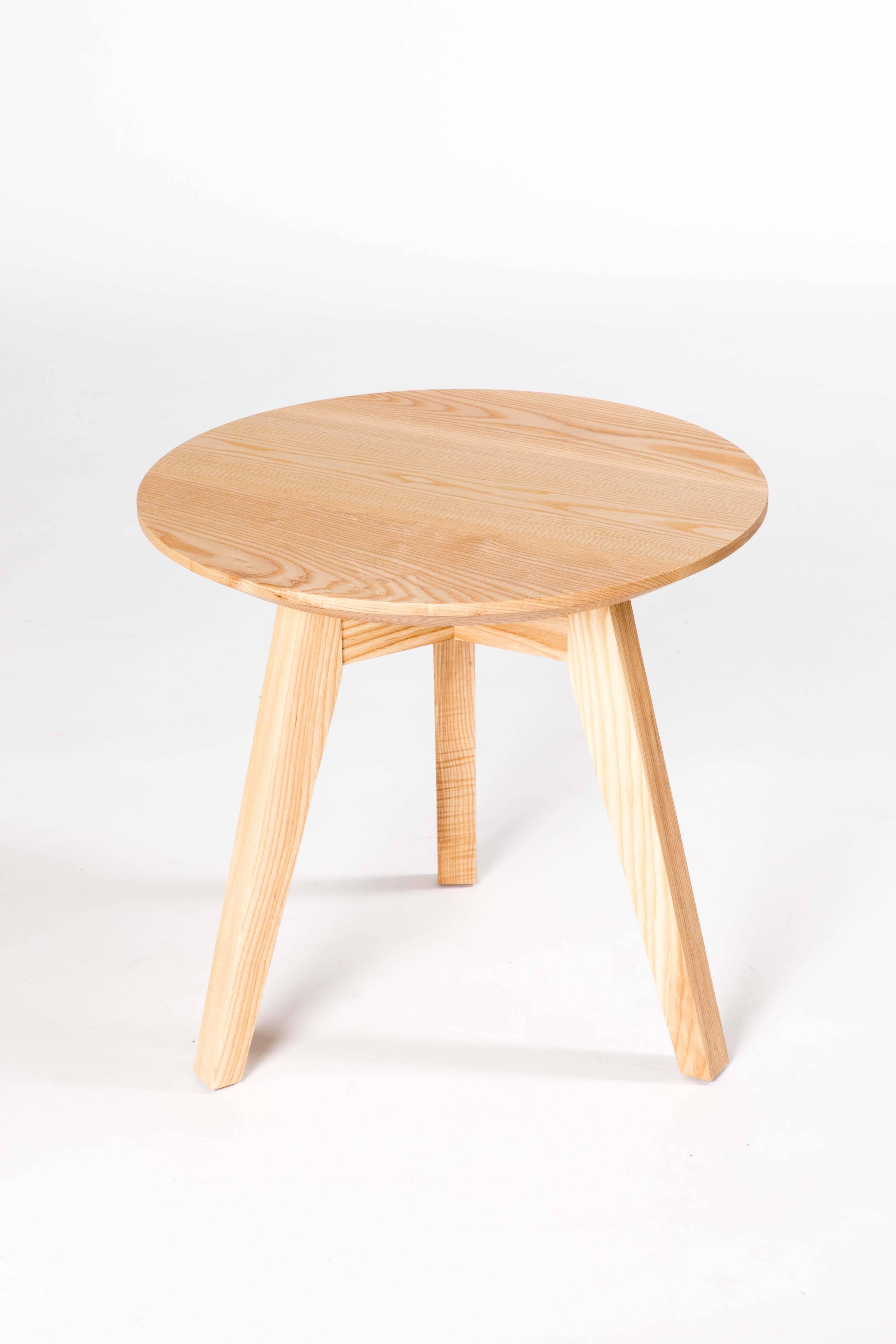 Each table in the occasional table series by Kate Duncan is designed with tapered legs and bevelled top which give the piece a distinct lightness that works well in a variety of settings. Rather than using a bulky skirt that wraps around the