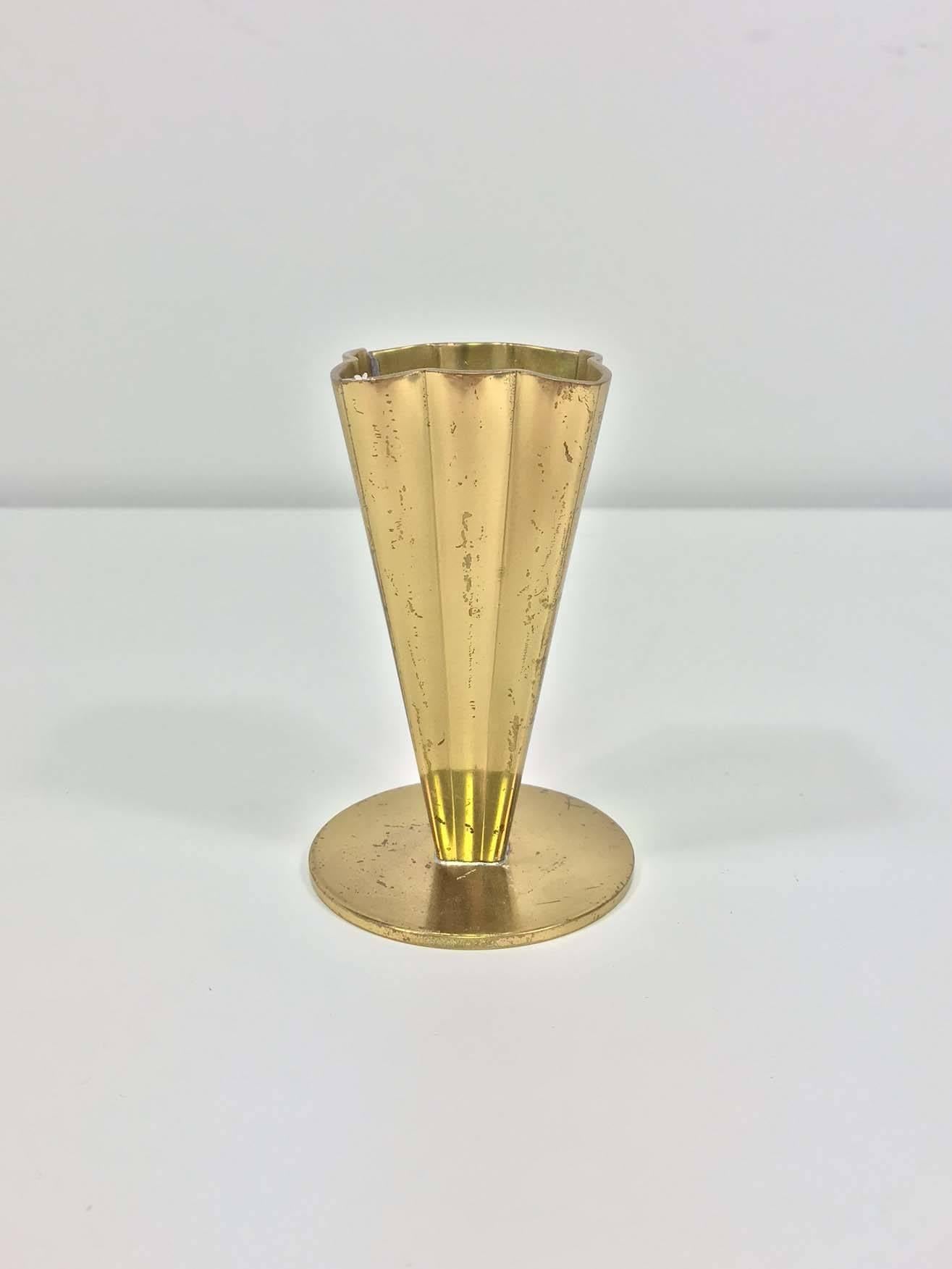 A small brass Ystad-Metall vase, minor wear consistent with age and use. Signed at bottom.