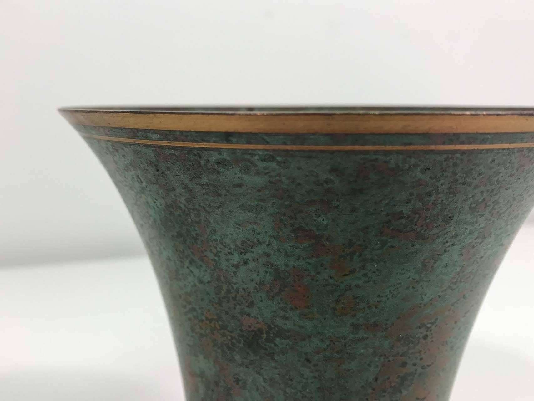 Art Deco bronze vase by Carl Sorensen. Wonderful original condition with minor wear consistent with age and use. Signed at bottom.
