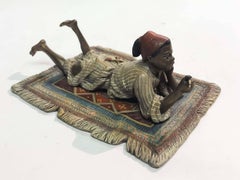 Arab Boy Smoking Cigar by Franz Bergman