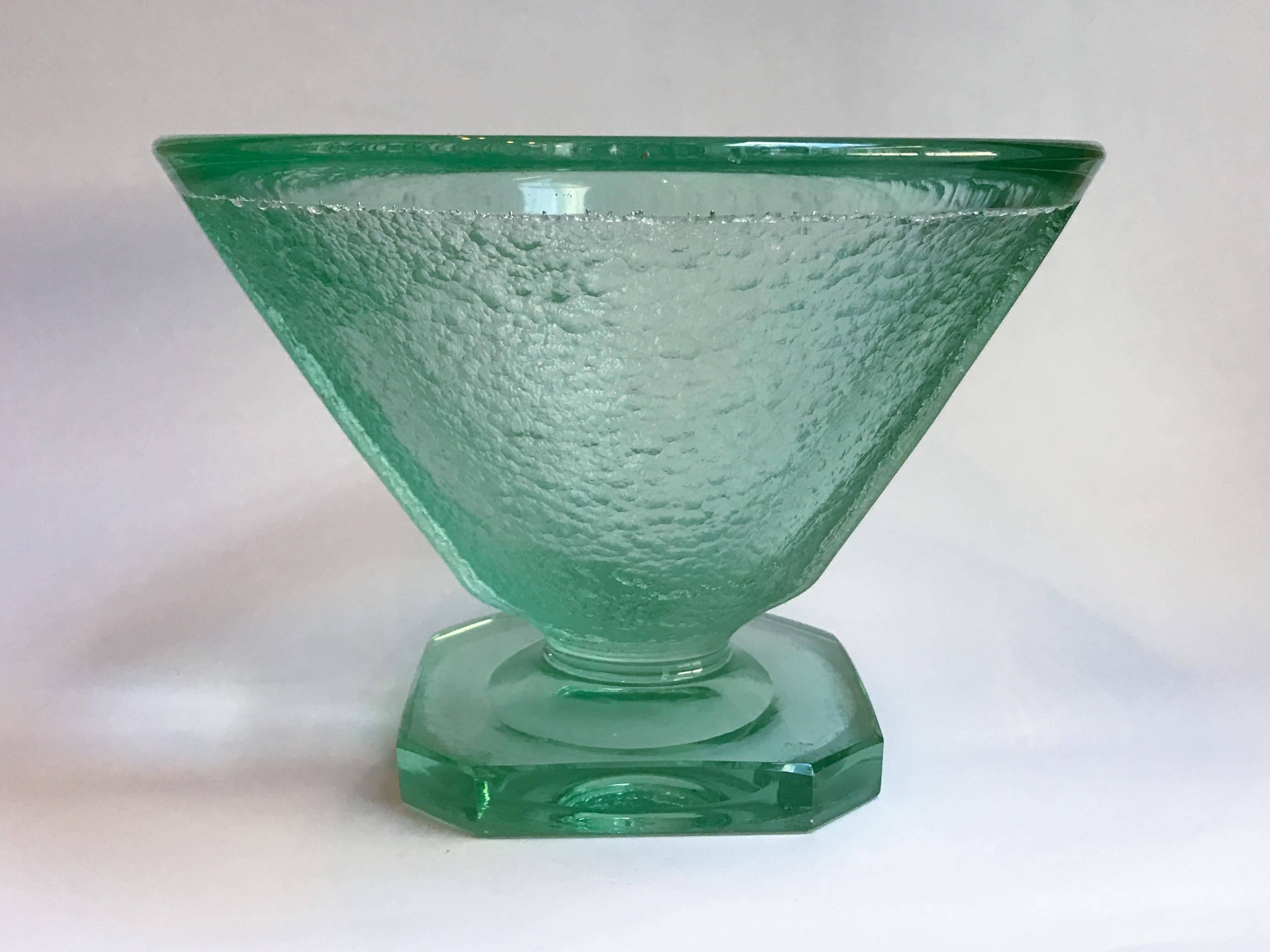 Thick green vessel on pedestal, unsigned, attributed to Daum, France.