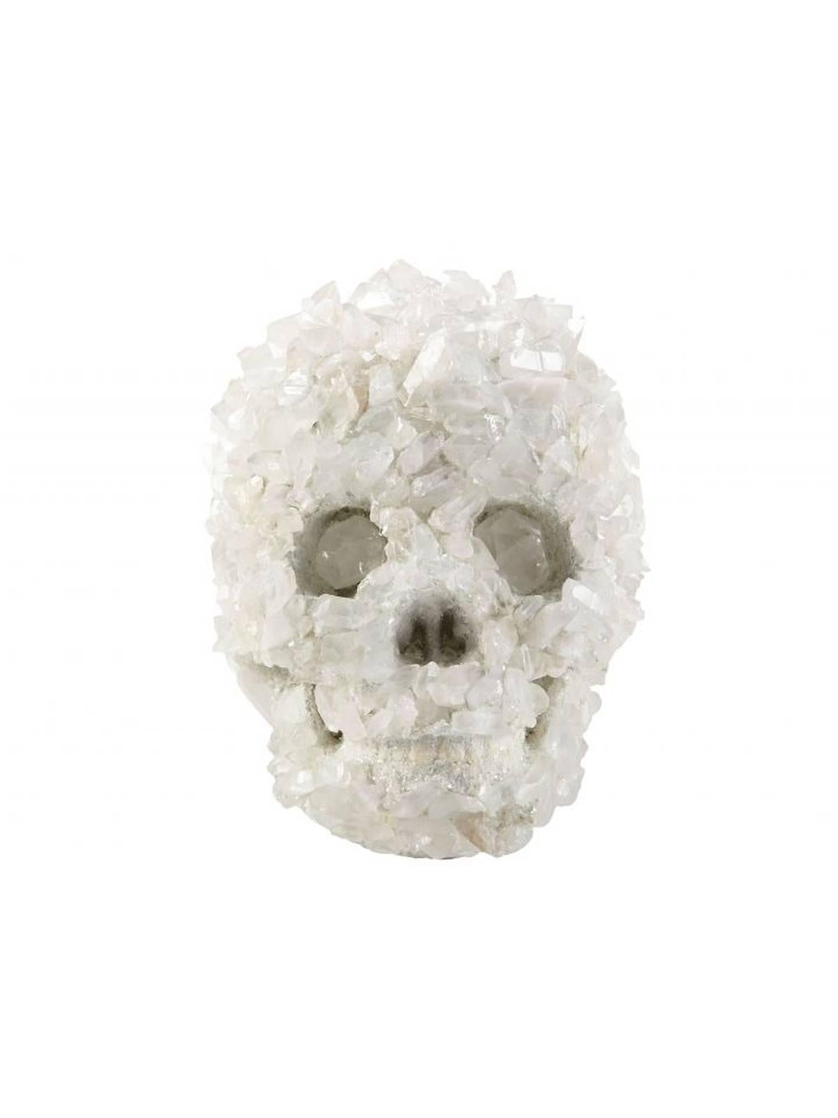 Skull entirely encrusted with intricate quartz from Arkansas. Each piece is carefully created using sculptural techniques. Handmade by artisans in Northern California.
 
