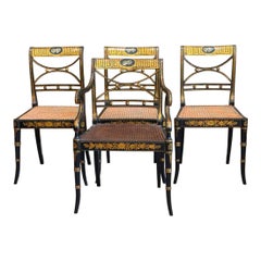 Set of Four English Regency Black Lacquer Dining Chairs with Gilt Decoration