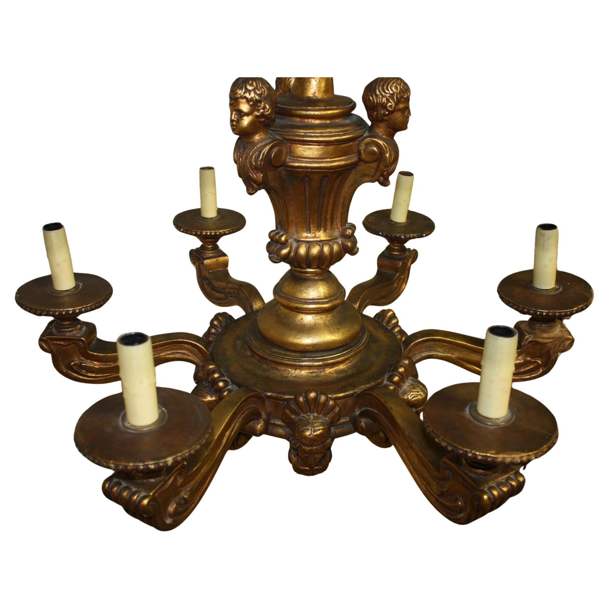 20ième siècle Lustre en bois doré français du début du 20e siècle en vente