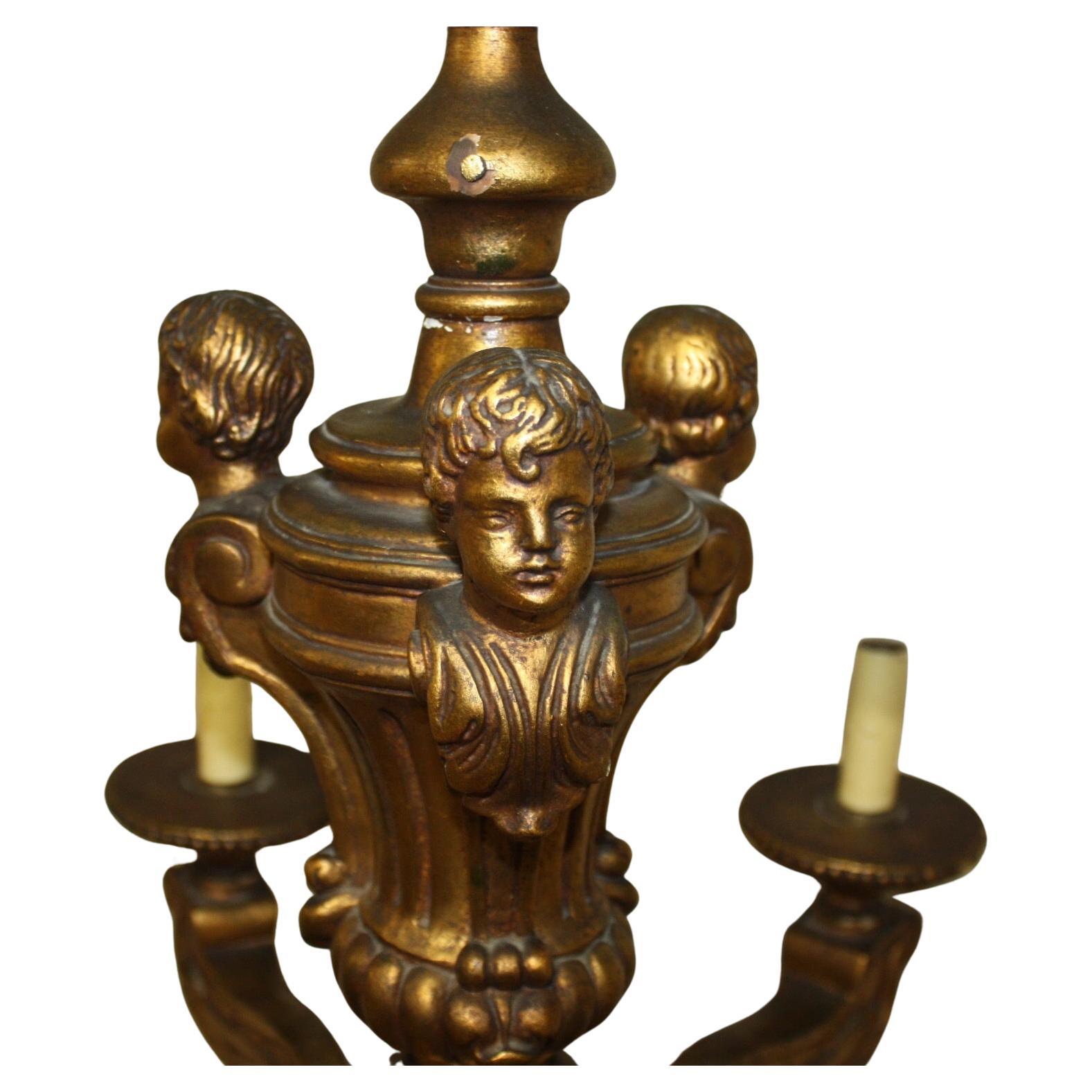 Français Lustre en bois doré français du début du 20e siècle en vente