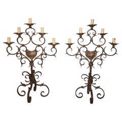 Coppia di candelabri in ferro francesi del XIX secolo