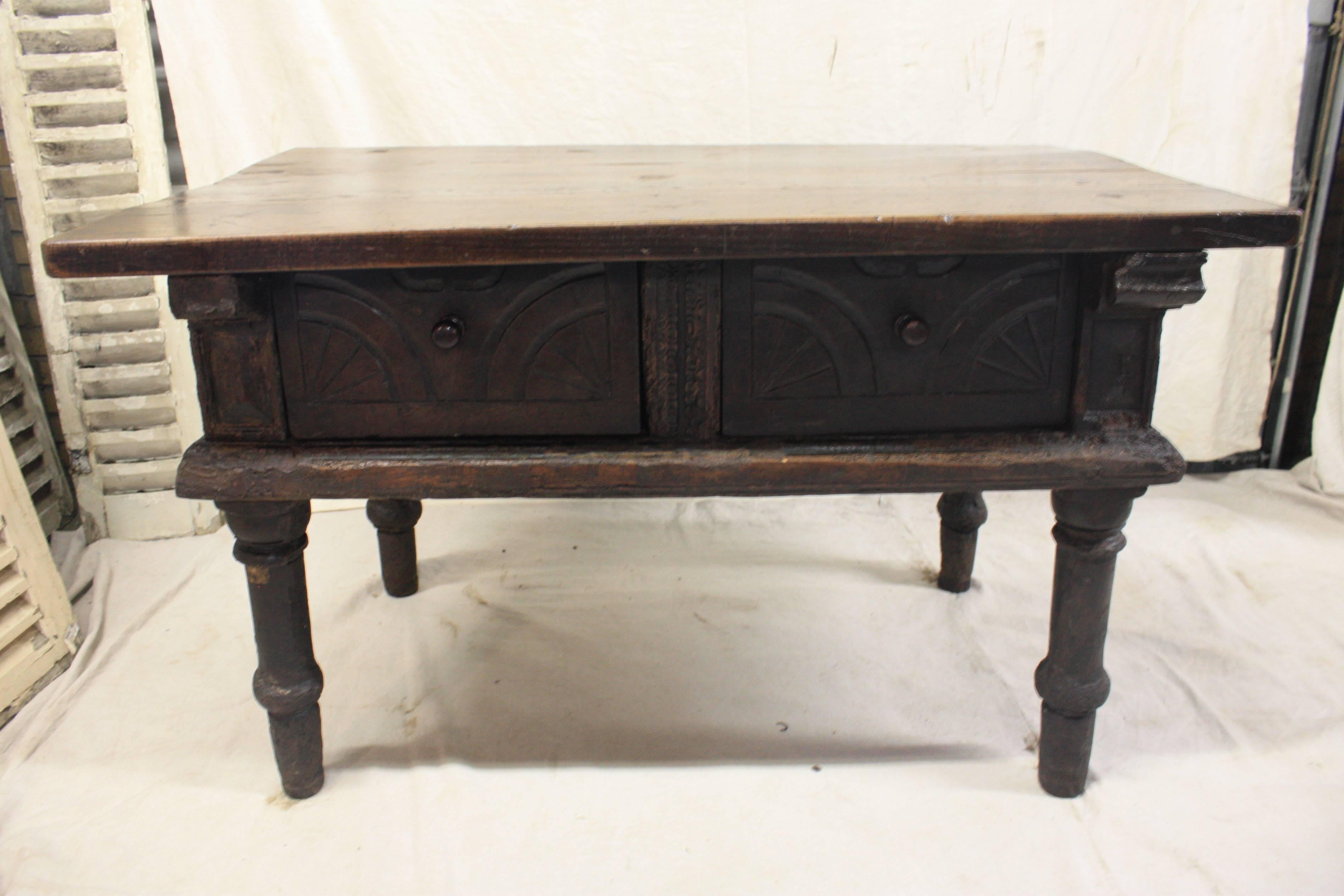 16th century Rustic French table. Hand-carved all along the belt.
