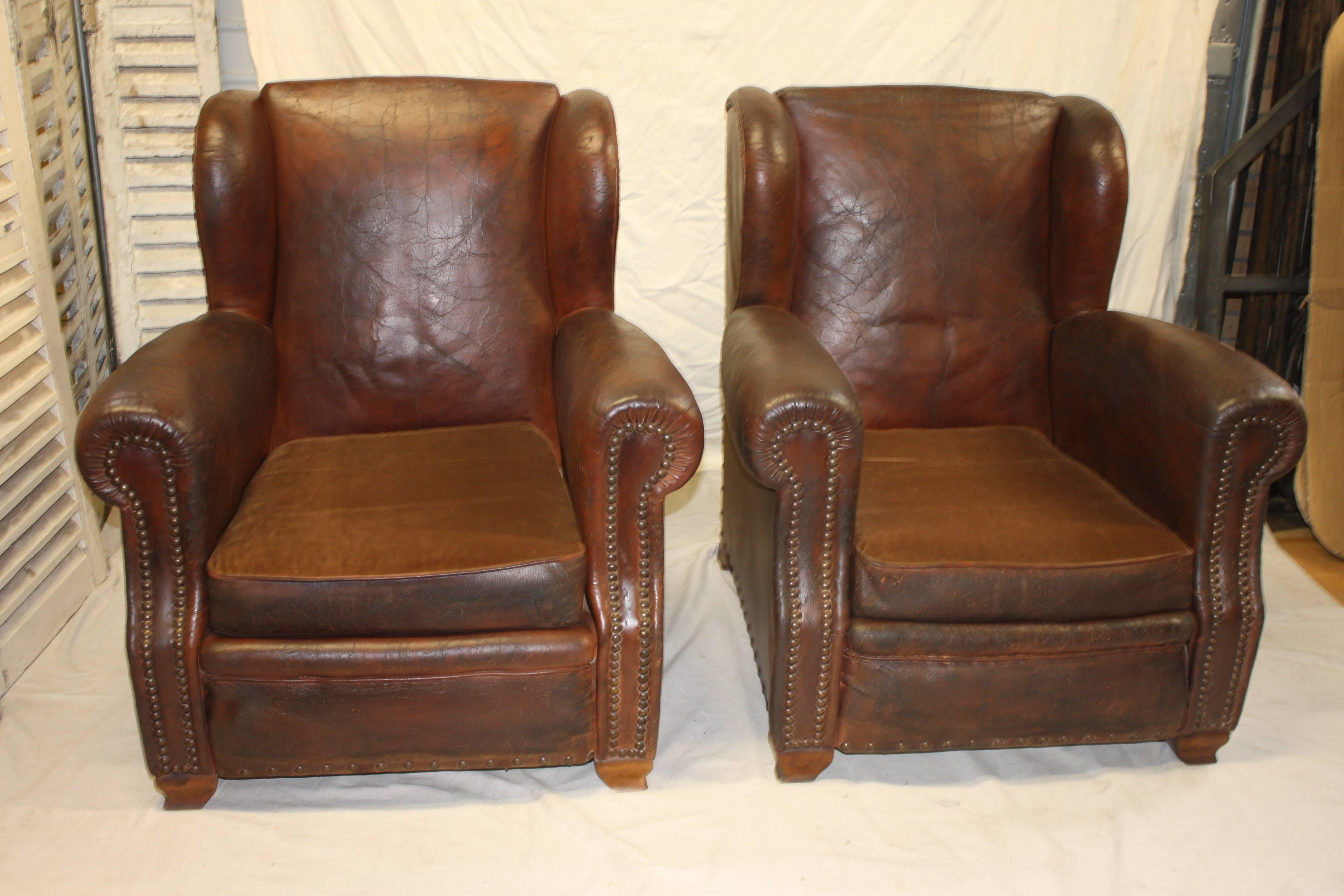 Pair of 19th century French leather club chairs.