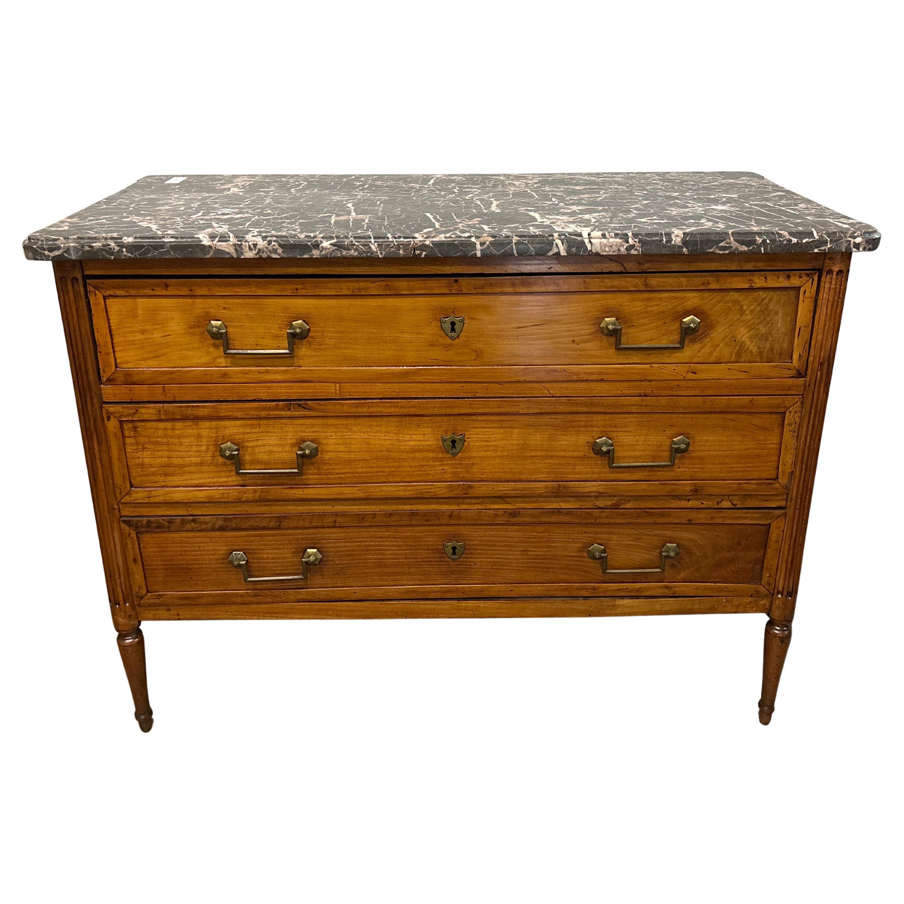 This wonderful 18th century chest is made of fruitwood and a beautiful marble top.