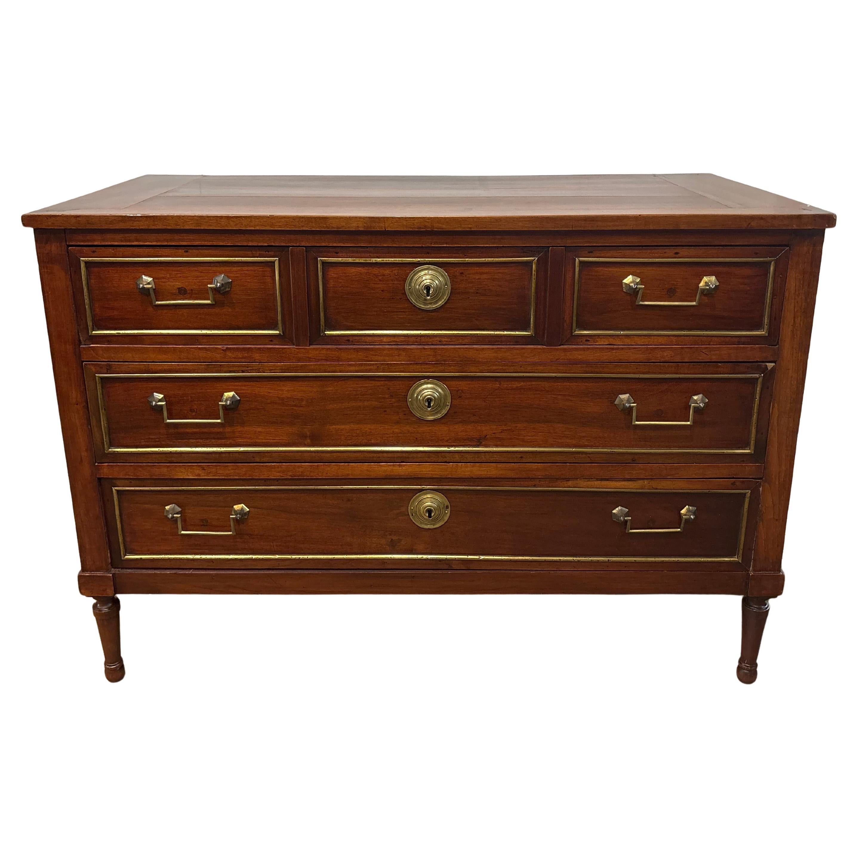 This is a beautiful French 18th Century Louis XVI Commode. It is made of mahogany with wonderful Key lock hardware.