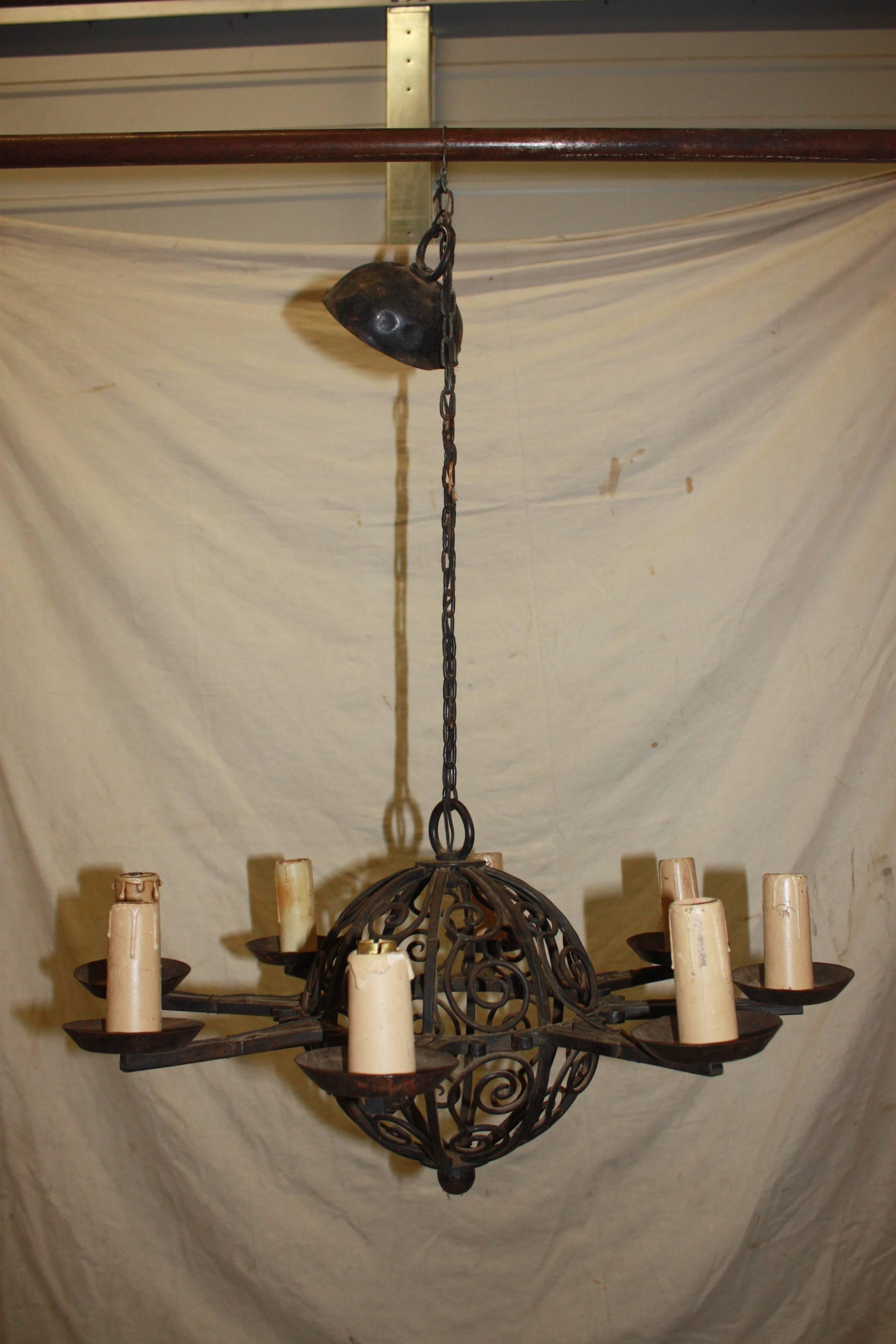 19th century French iron chandelier with eight lights.