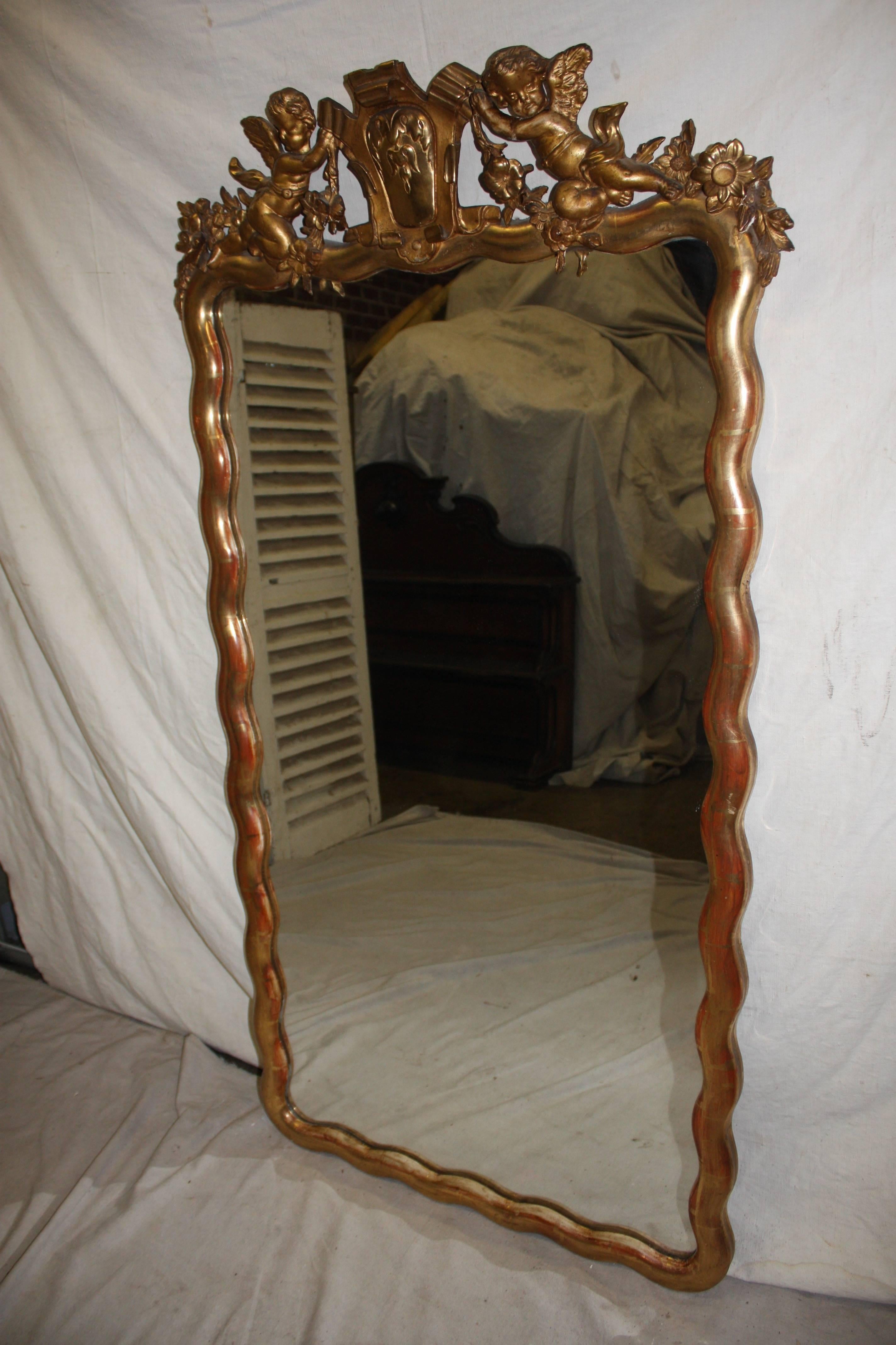 19th century French giltwood mirror.