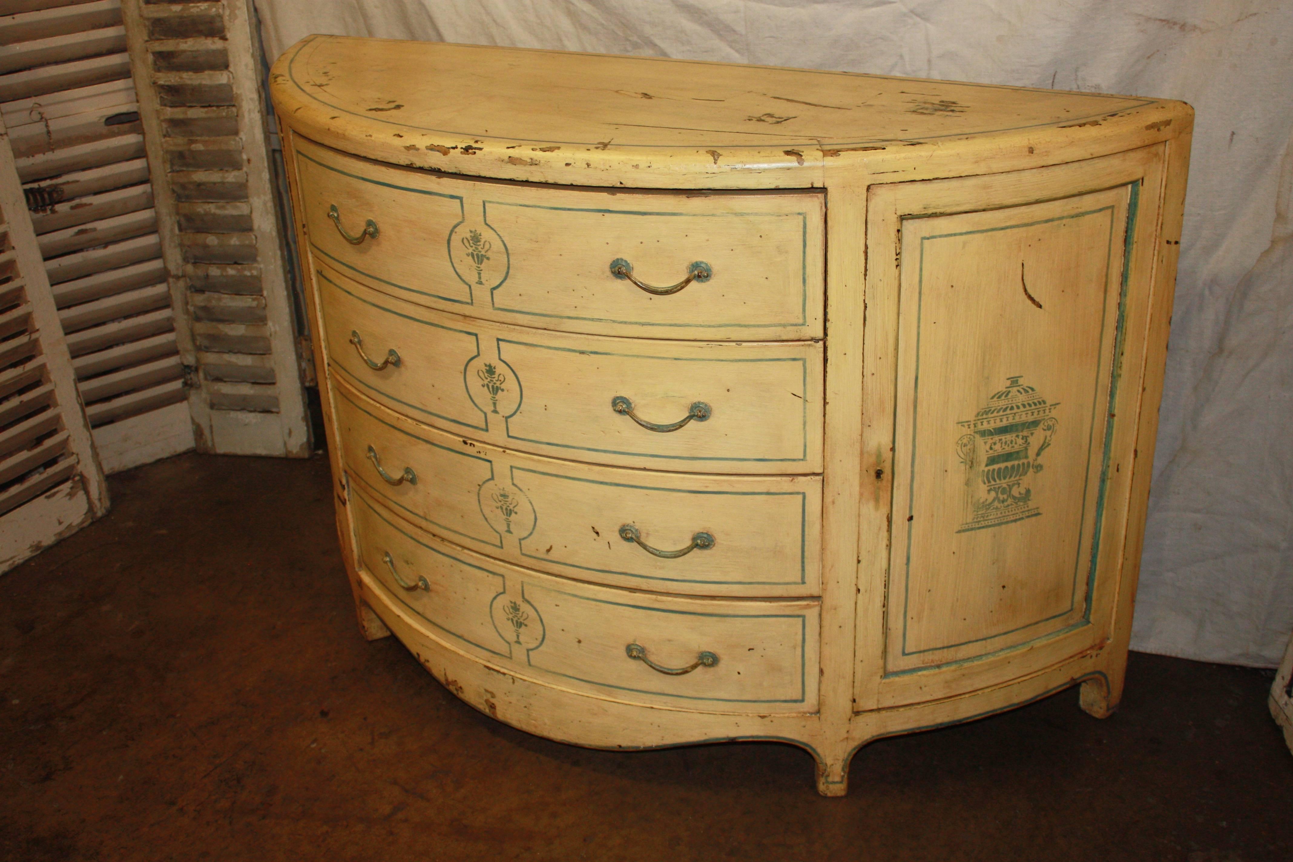 Charming early 20th century half-moon chest.