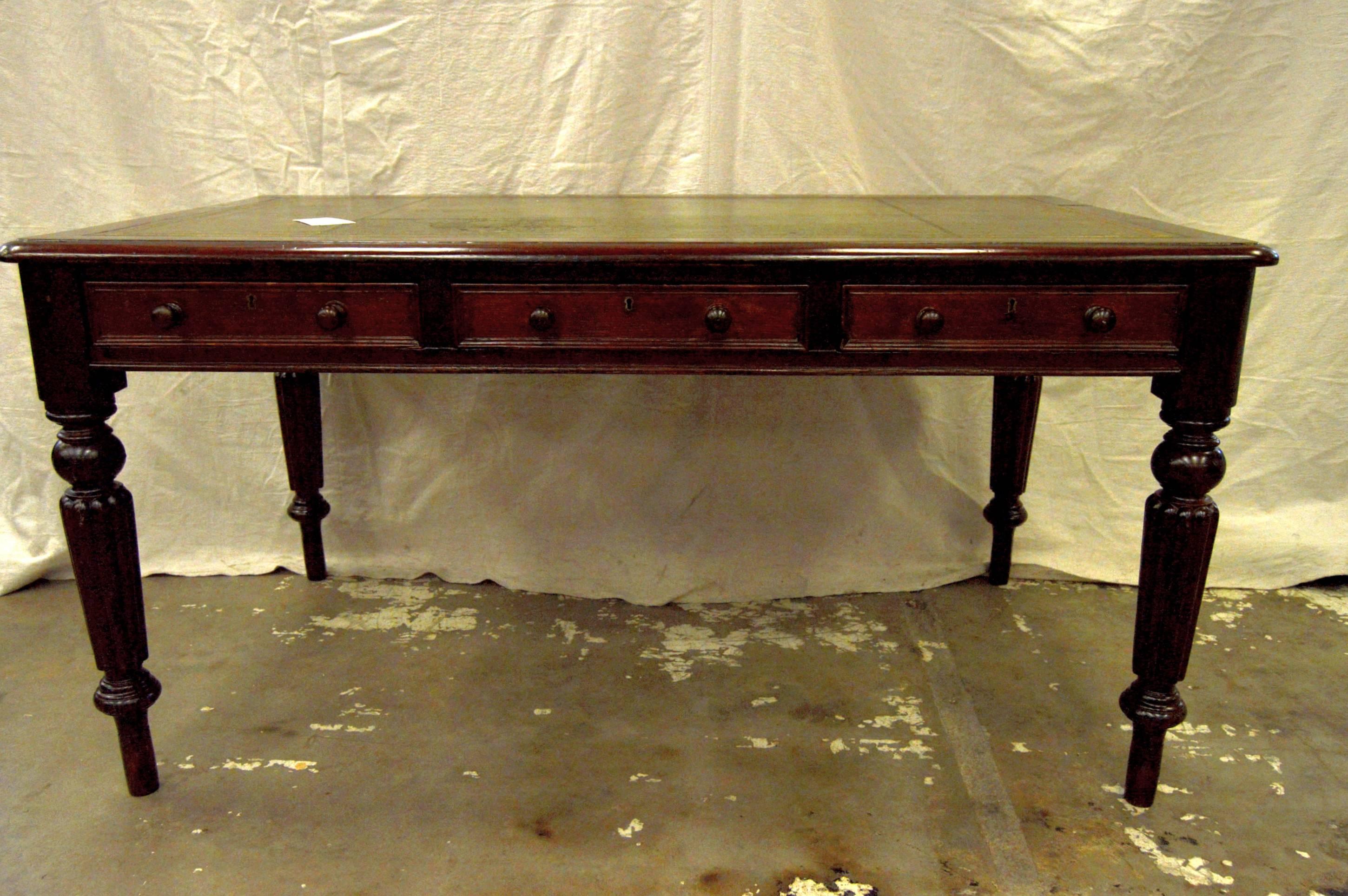 19th century French desk in mahogany with its original leather top.