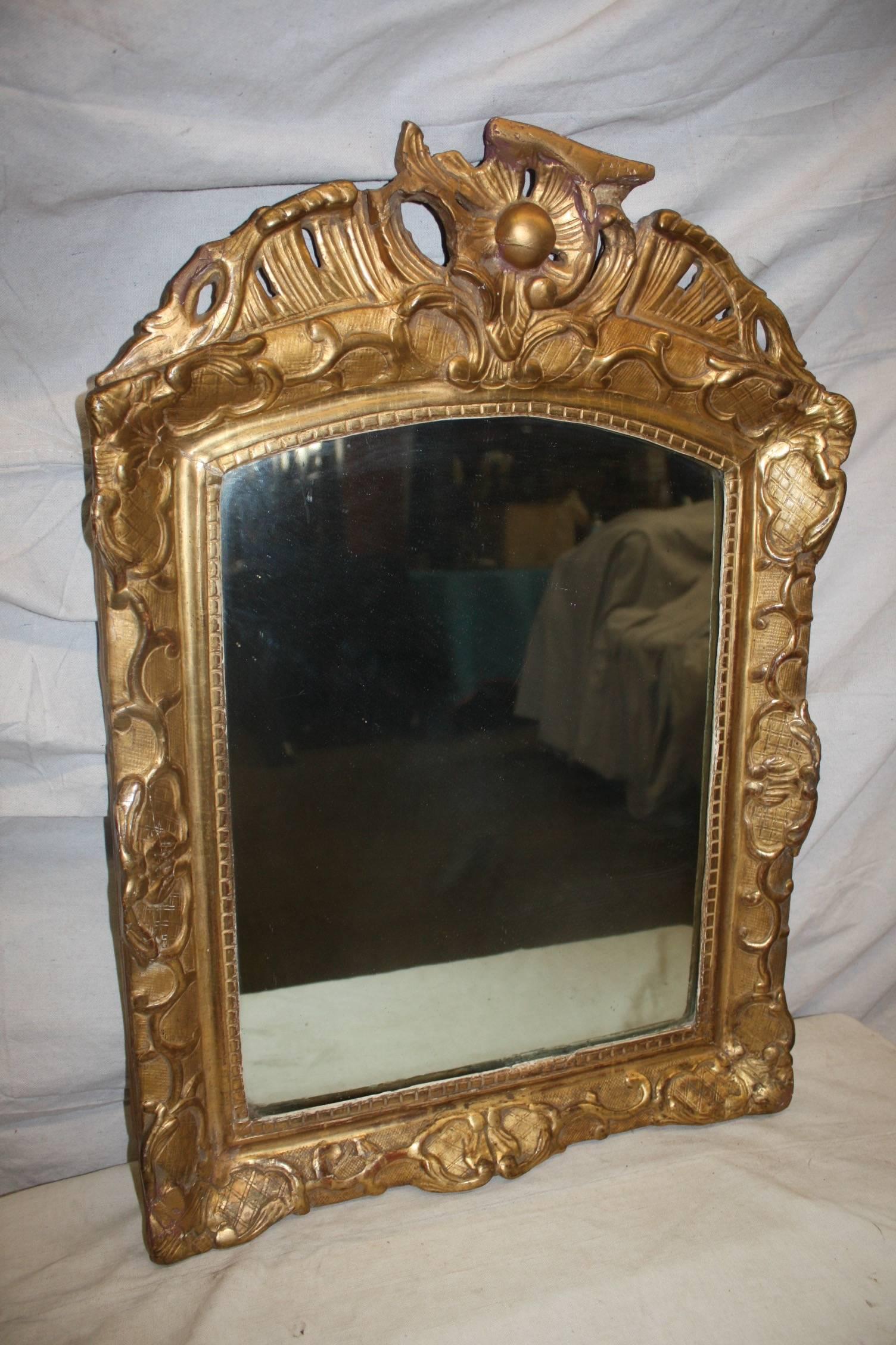 Charming French period Regence mirror.