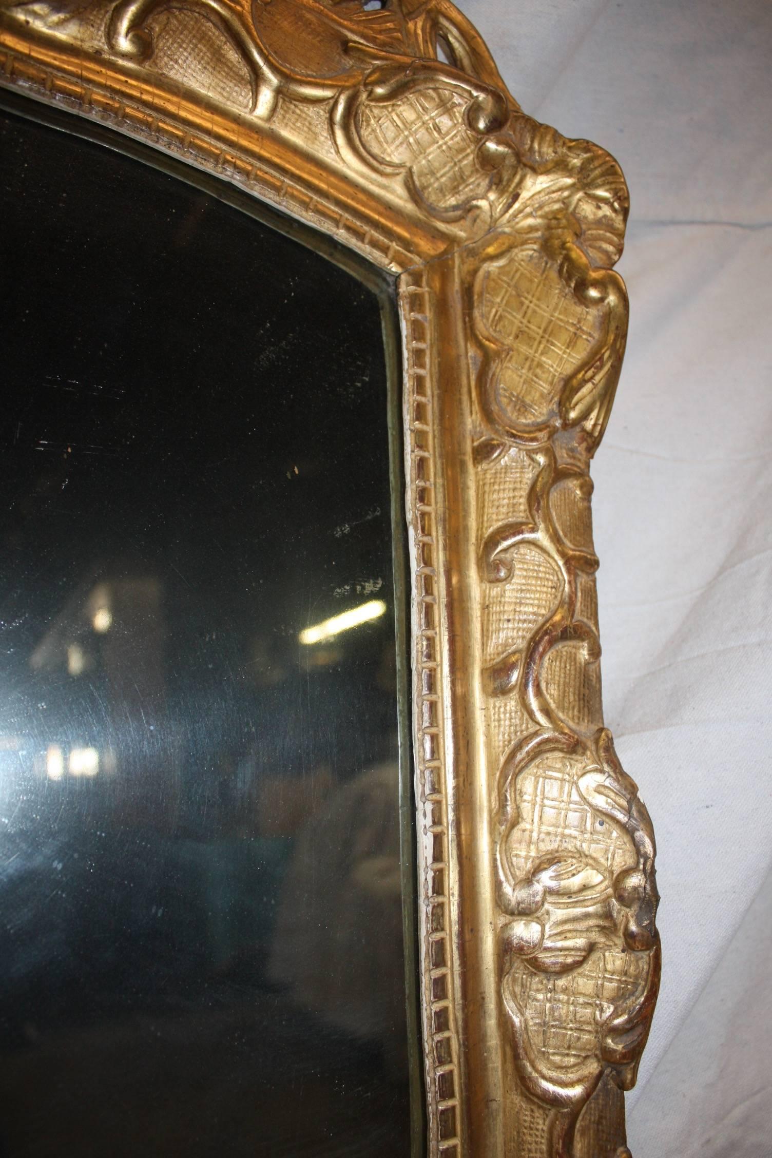 Gilt French Period Regence Mirror For Sale