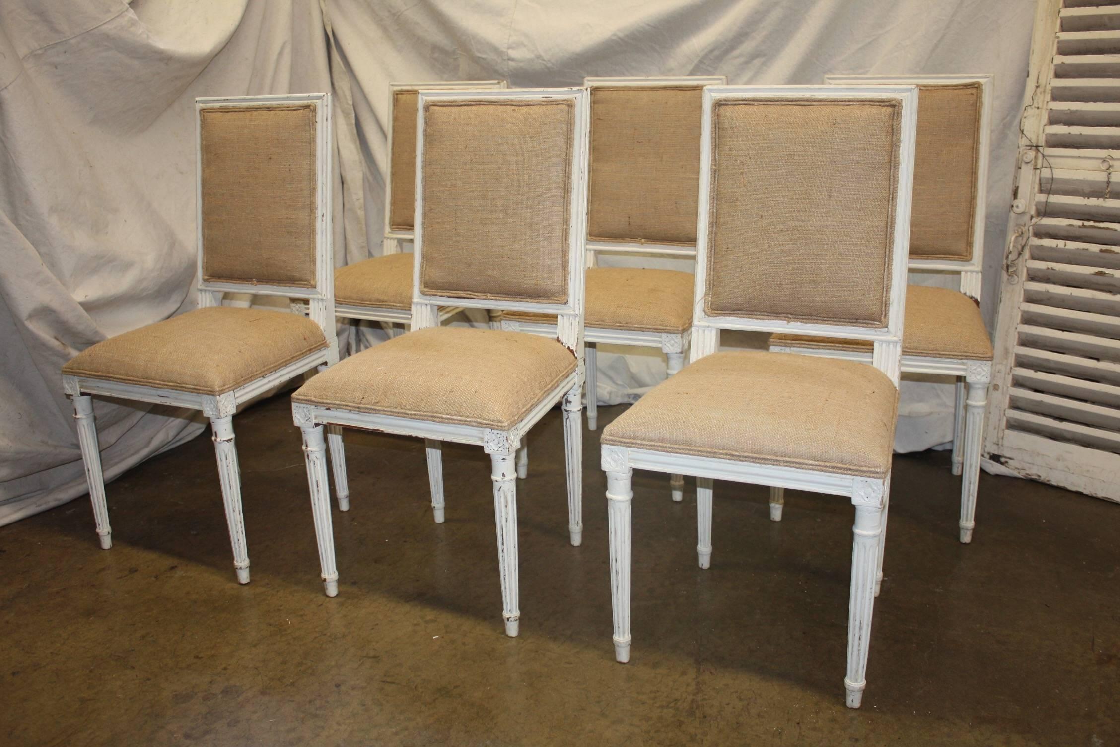 Set of six painted French chairs.