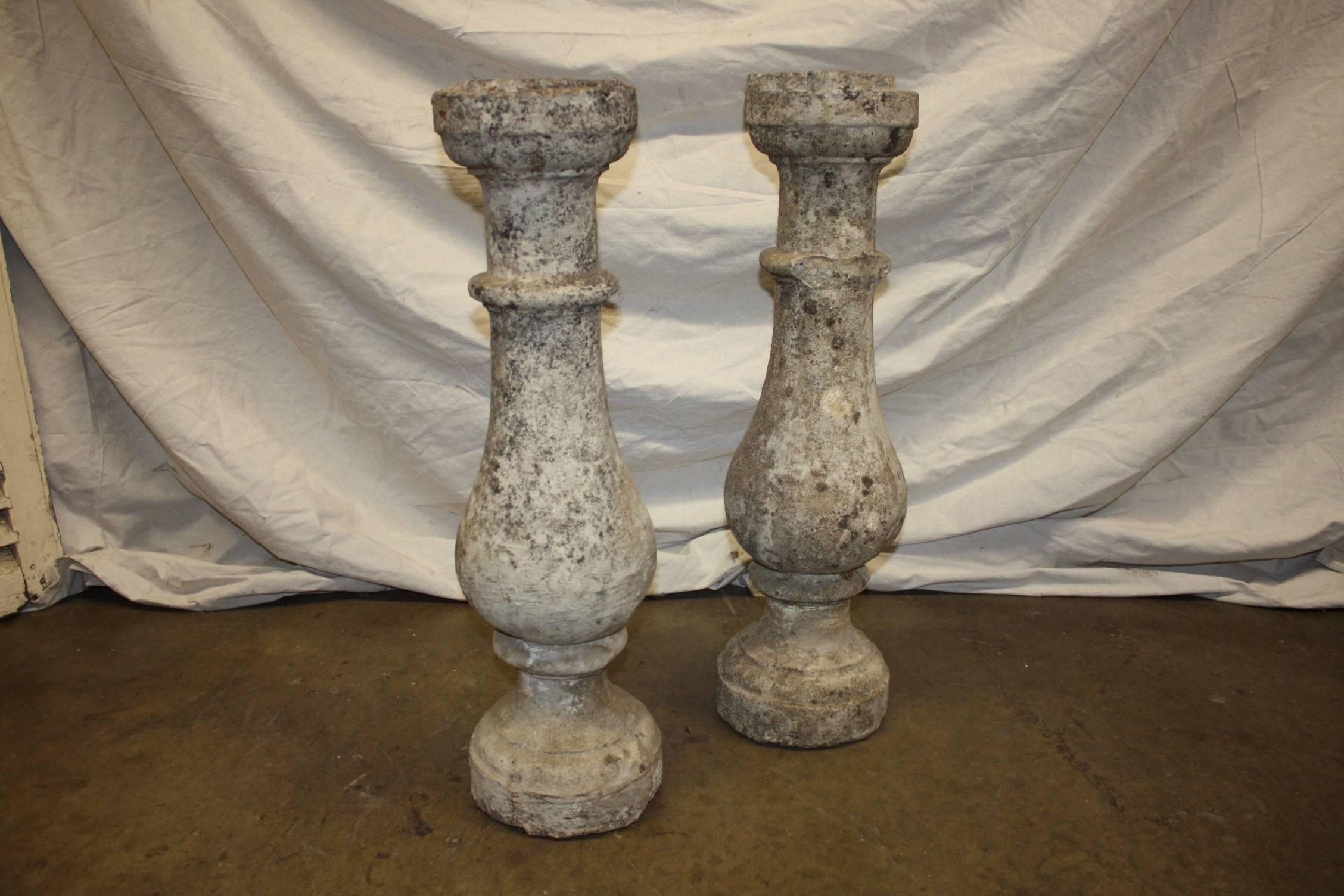 Pair of 19th century French balusters in concrete stone, those are elements from a concrete stone balcony.