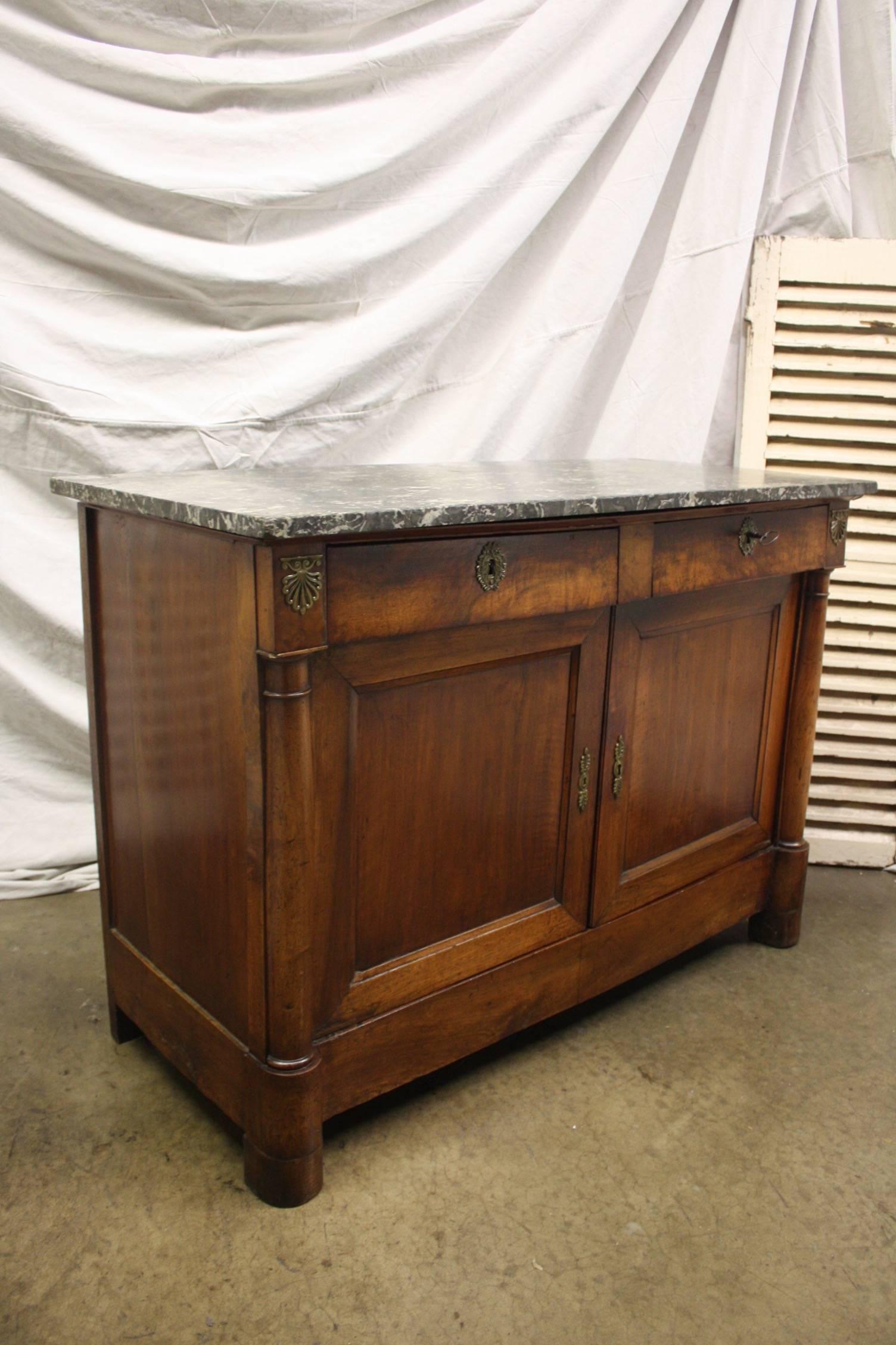 French Empire period buffet with a marble top 