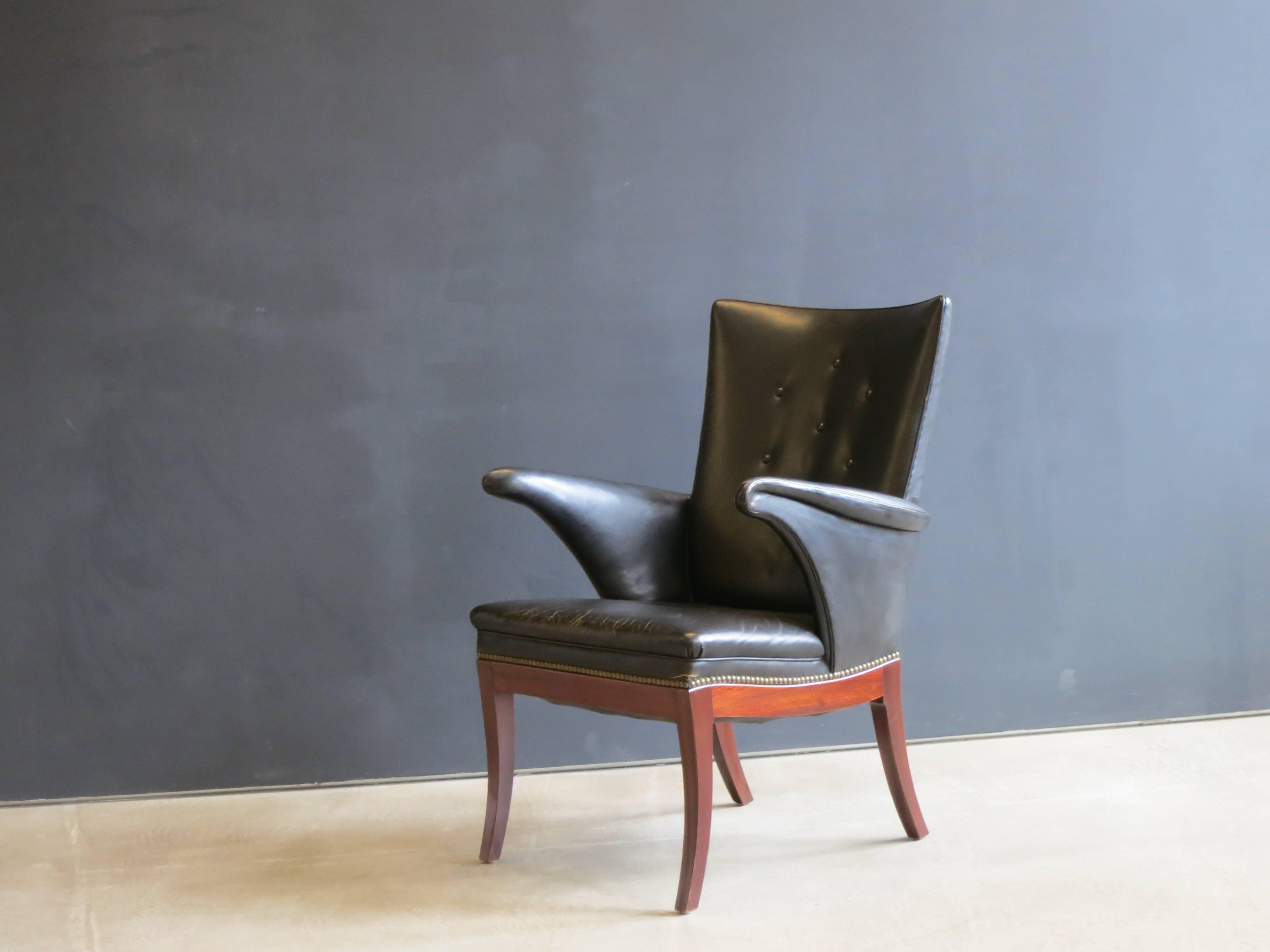 Patinated 1930s Armchair in Original Black Leather by Frits Henningsen For Sale