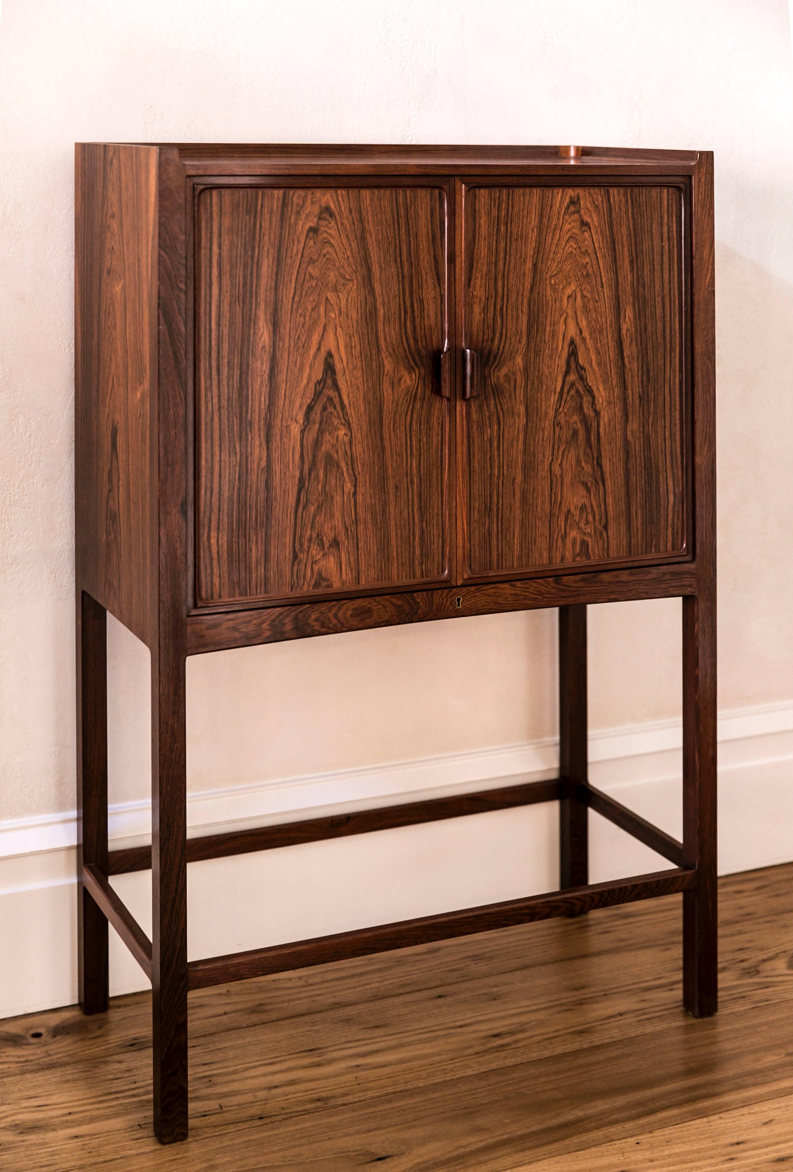 Offerd by Vance Trimble, Small Freestanding Cabinet with Cedar Wood Interior by Ludvig Pontoppidan. This small and beautiful cabinet was designed and made by Danish designer and master cabinetmaker, Ludvig Pontoppidan. The exterior is of