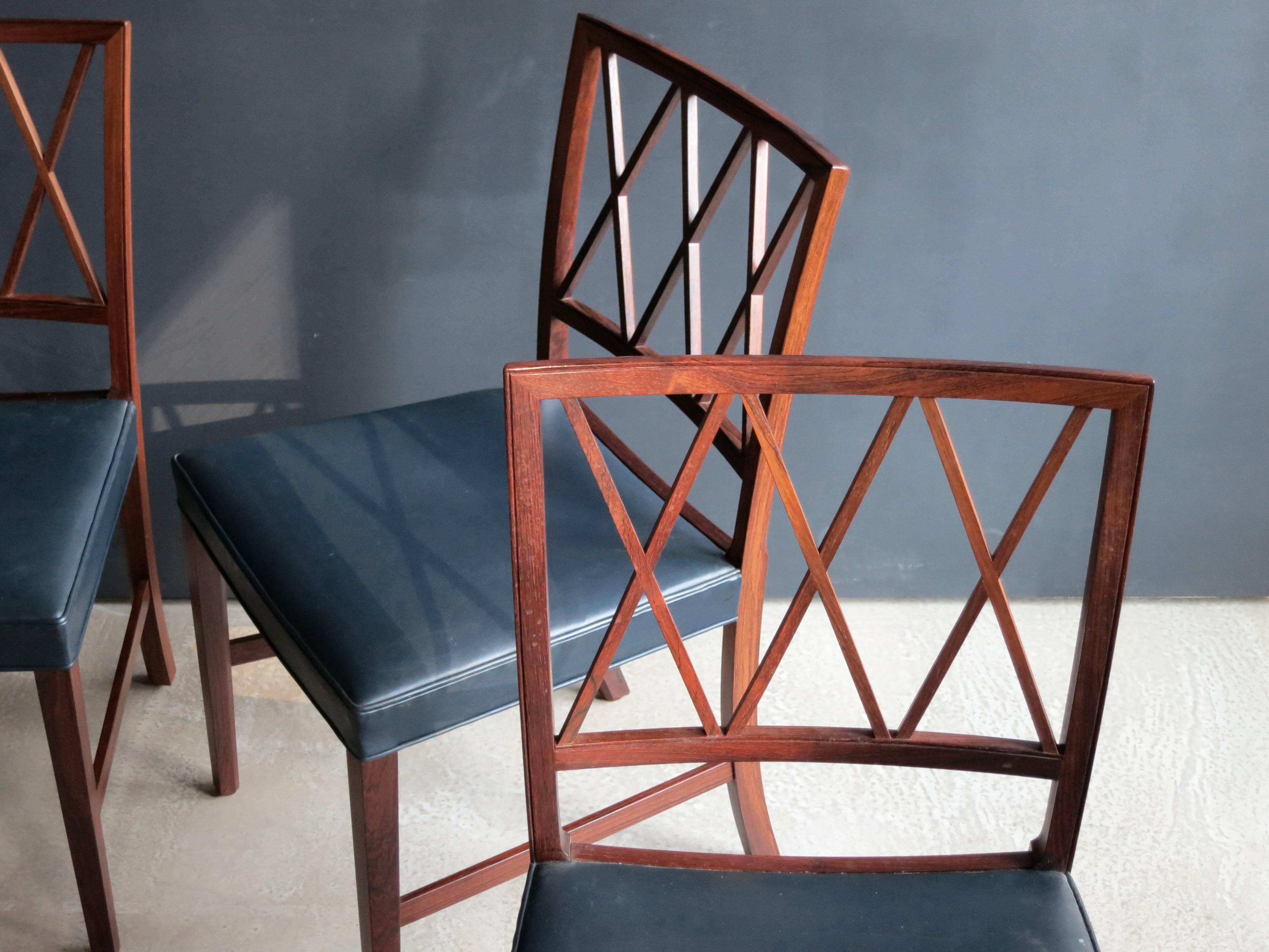 Scandinavian Modern Twelve Exceptional Brazilian Rosewood Dining Chairs by Ole Wanscher For Sale