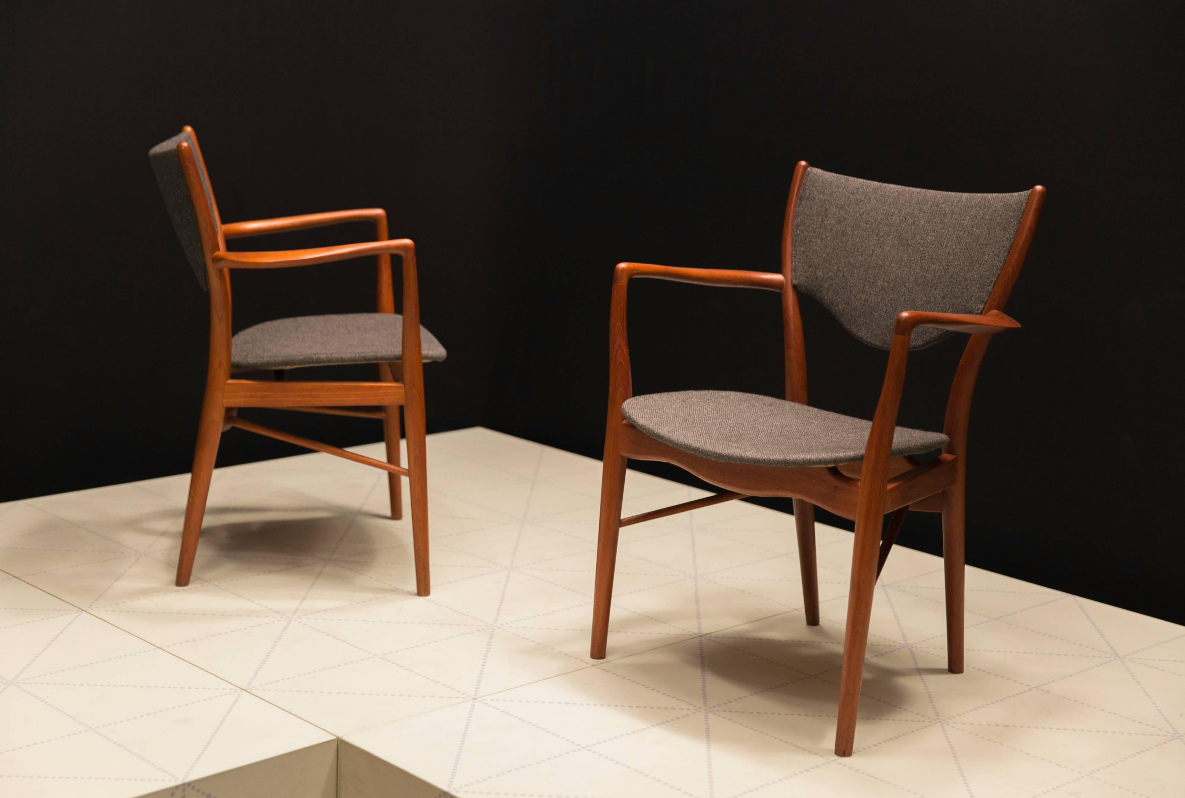 Pair of Finn Juhl BO-46 Chairs in Teak and Original Charcoal Wool Seats. Finn Juhl originally designed this chair for cabinetmaker Niels Vodder in 1946. In his second version, made by Bovirke from 1953, Finn Juhl's aim was to emphasize the lightness