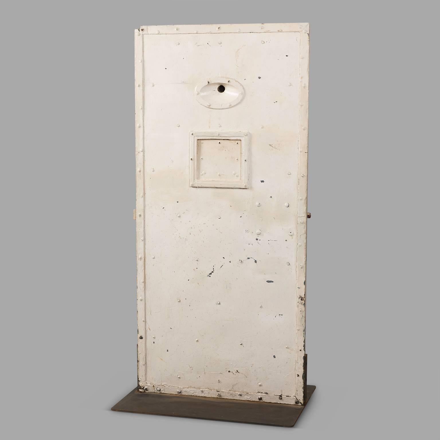 Jail cell door made of solid oak and riveted sheet metal. With genuine mechanisms and keys.
Stabilized on sheet metal slab.