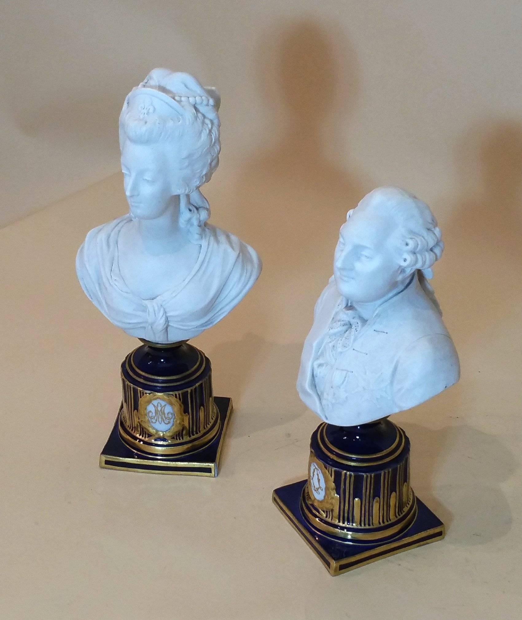 These outstanding and highly detailed busts of Louis XVI and Marie Antoinette are Sevres porcelain, a porcelain factory founded in 1738 at Chateau de Vincennes, France. The Busts are in bisque white, and each has been mounted on a dark royal blue