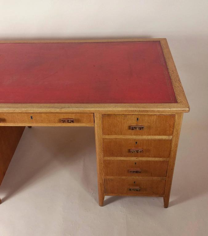 1930s Light Oak Pedestal Desk With Original Leather Top At 1stdibs This Sy And Substantial Light Oak 1930s Pedestal Desk Features Nine Drawers The Original Leather