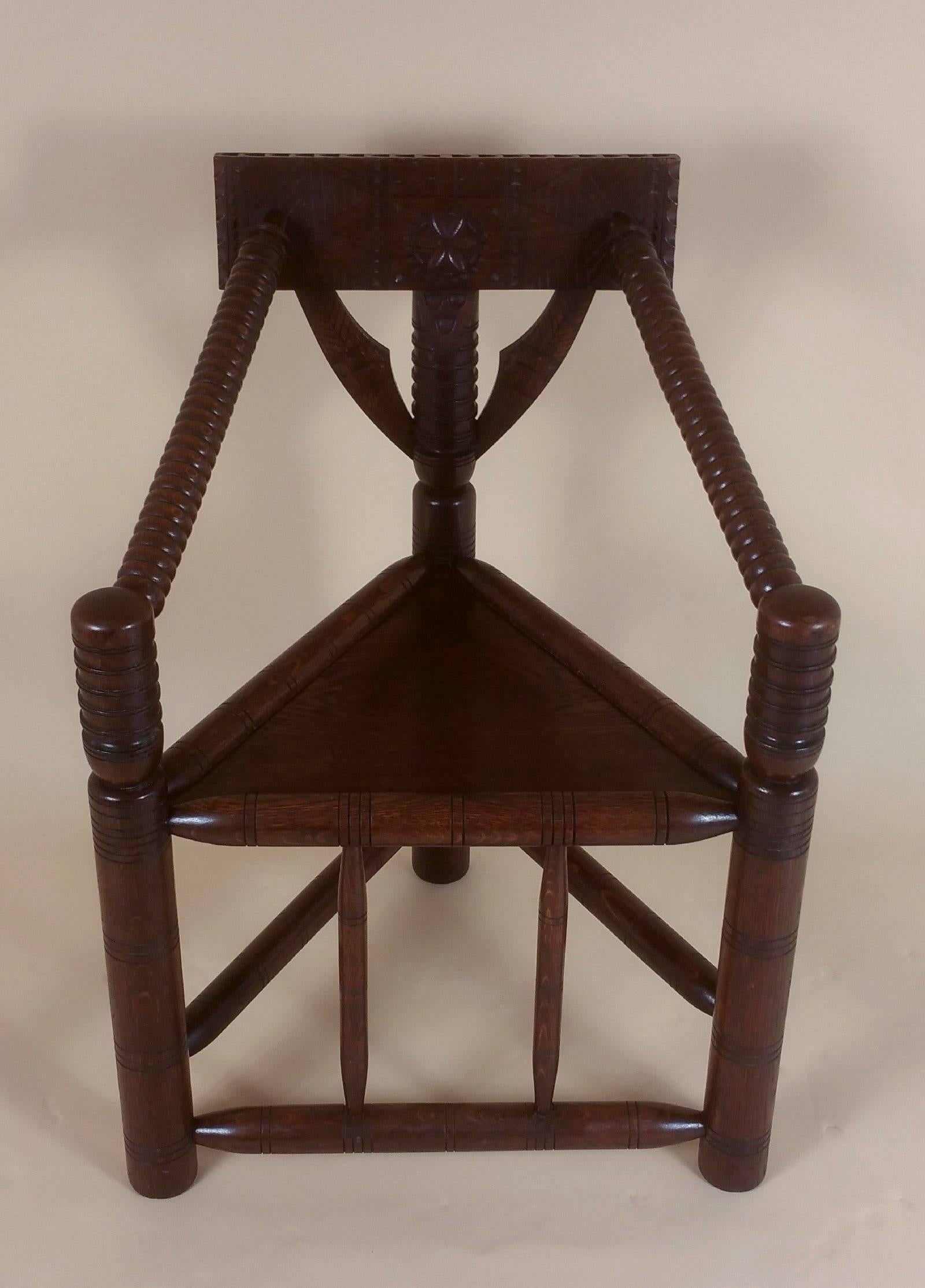 This unusual and finely crafted corner chair is in the ‘Turners’ style and features a lovely warm patina with detailed carved decoration. The chair measures 24 ½ in – 62.2 cm wide, 22 in – 56 cm deep and 34 in – 86.3 cm in height with a seat height