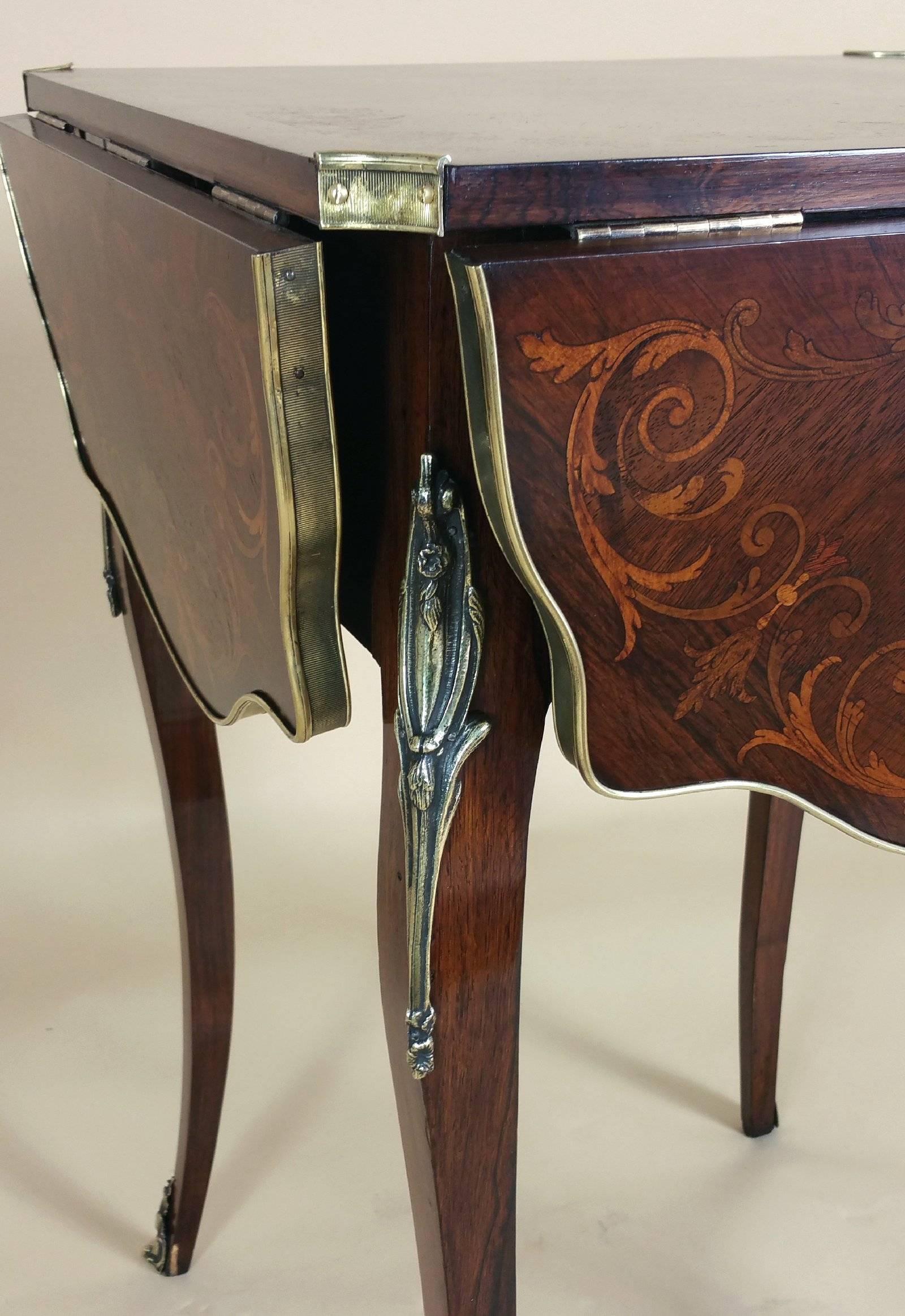 19th Century French Marquetry Inlaid Rosewood Centre Table with Four Folding Sides