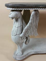 Early 20th Century Carved Wood Dining Table Supported by Winged Griffins