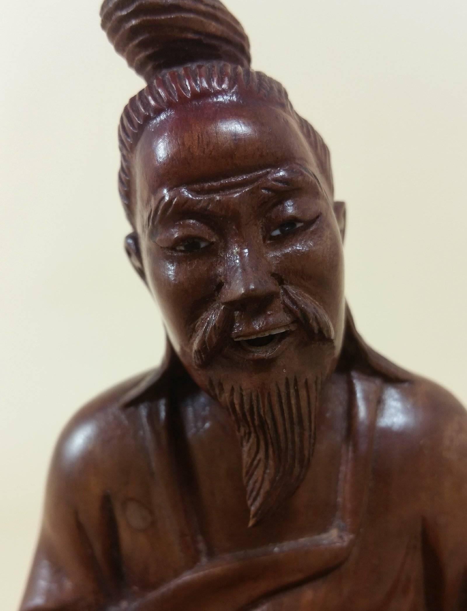 Japanese Fruitwood Carving of a Gentleman Smoking a Pipe 3